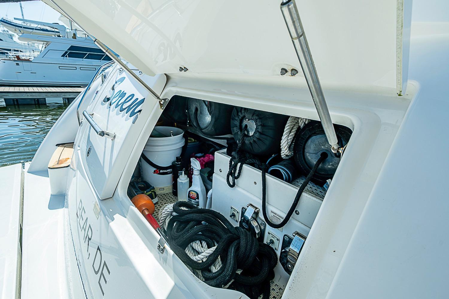 Storage compartment of a 2008 Sea Ray 60 Sundancer yacht, featuring ropes and equipment.