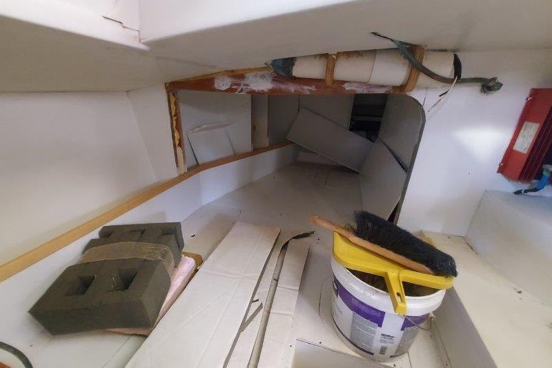 Interior of a 2017 Bruce Roberts Spray boat under construction, with tools and materials.