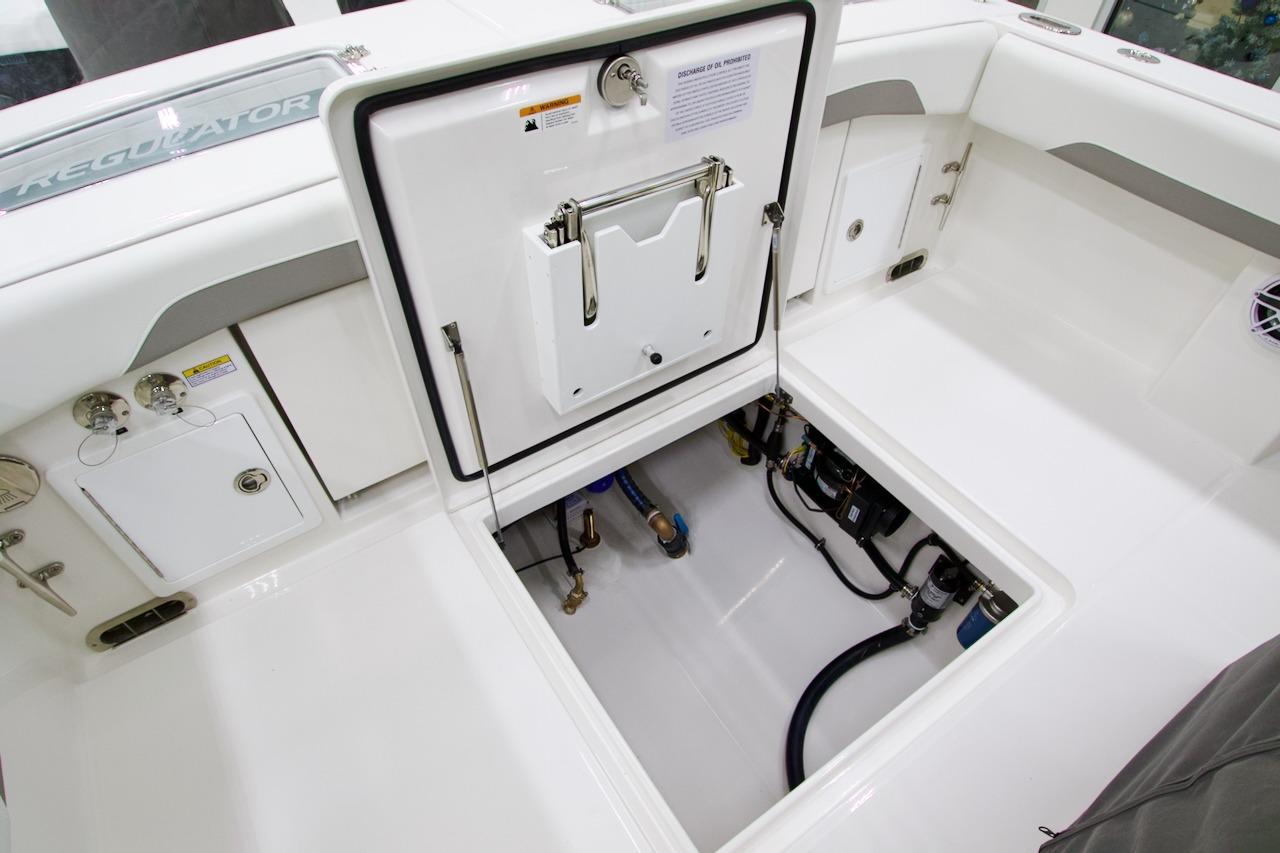 2026 Regulator 31 boat interior with open hatch and visible equipment.