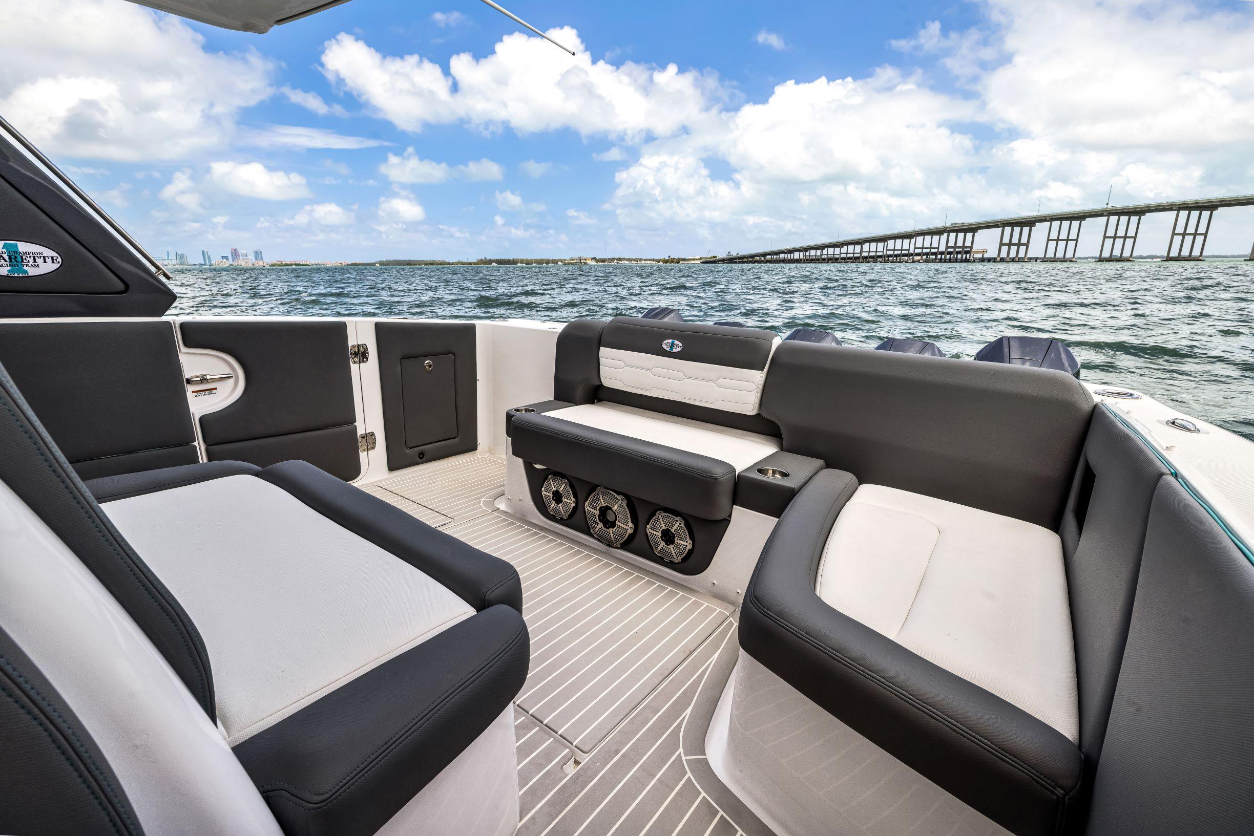 Luxury seating on 2022 Cigarette 42 Auroris boat with ocean view.