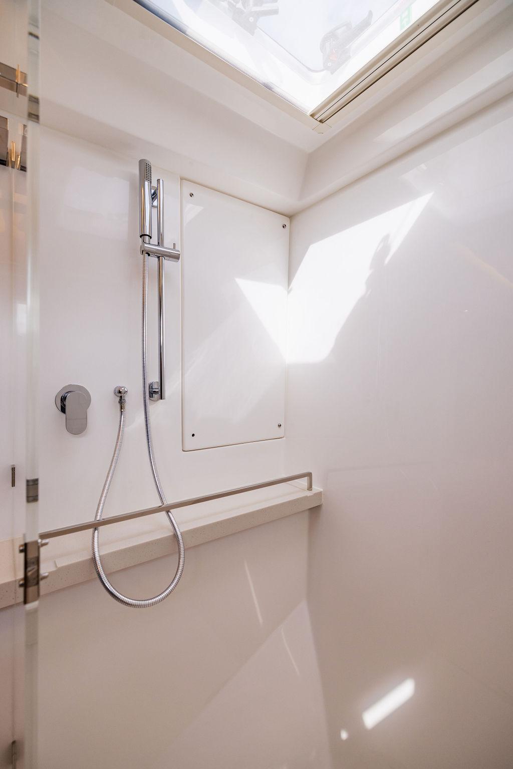 Modern shower area in 2024 Leopard 45 yacht with sleek fixtures.