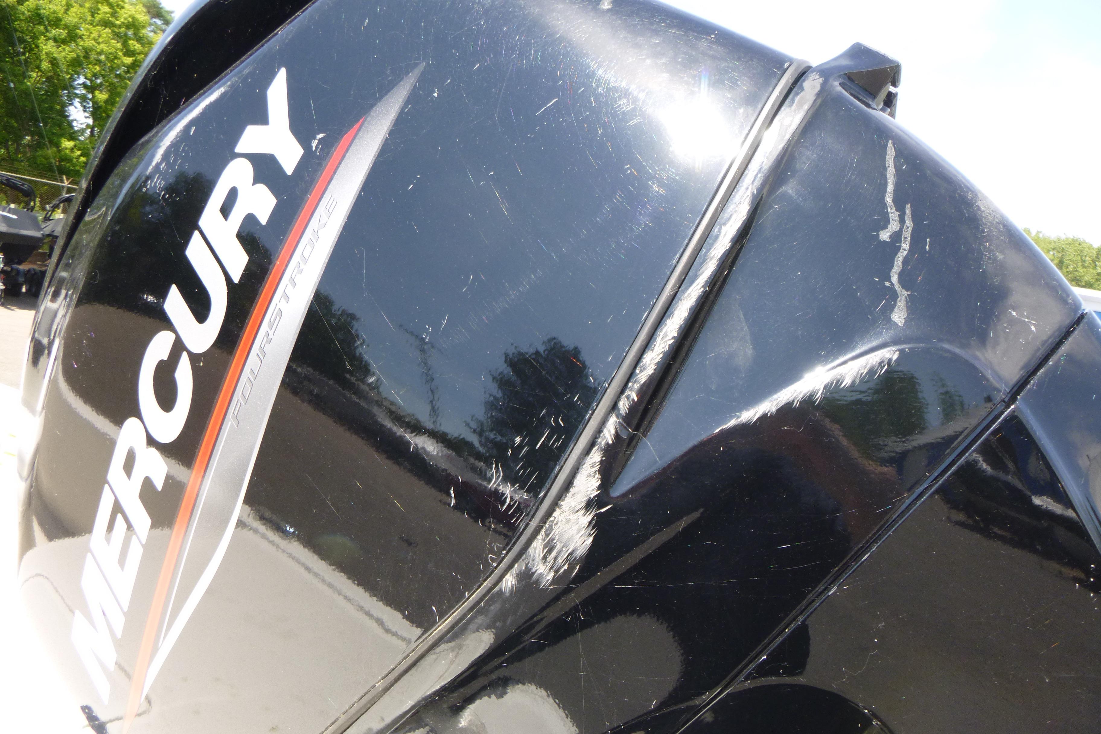 Close-up of a Mercury FourStroke engine on a 2024 Mako Pro Skiff 17 CC boat.