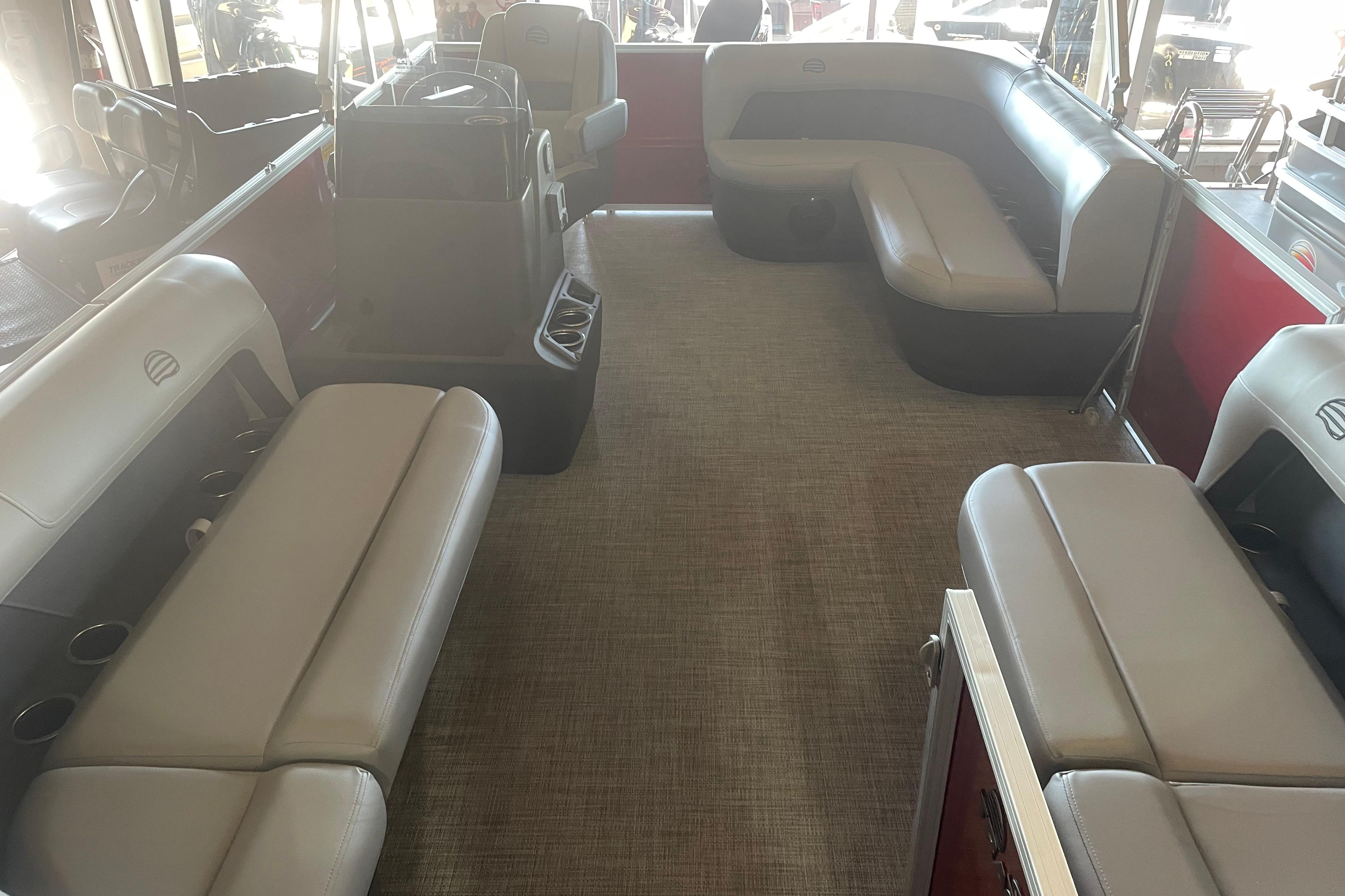 2026 Sun Tracker Party Barge 16 DLX interior with spacious seating and modern design.