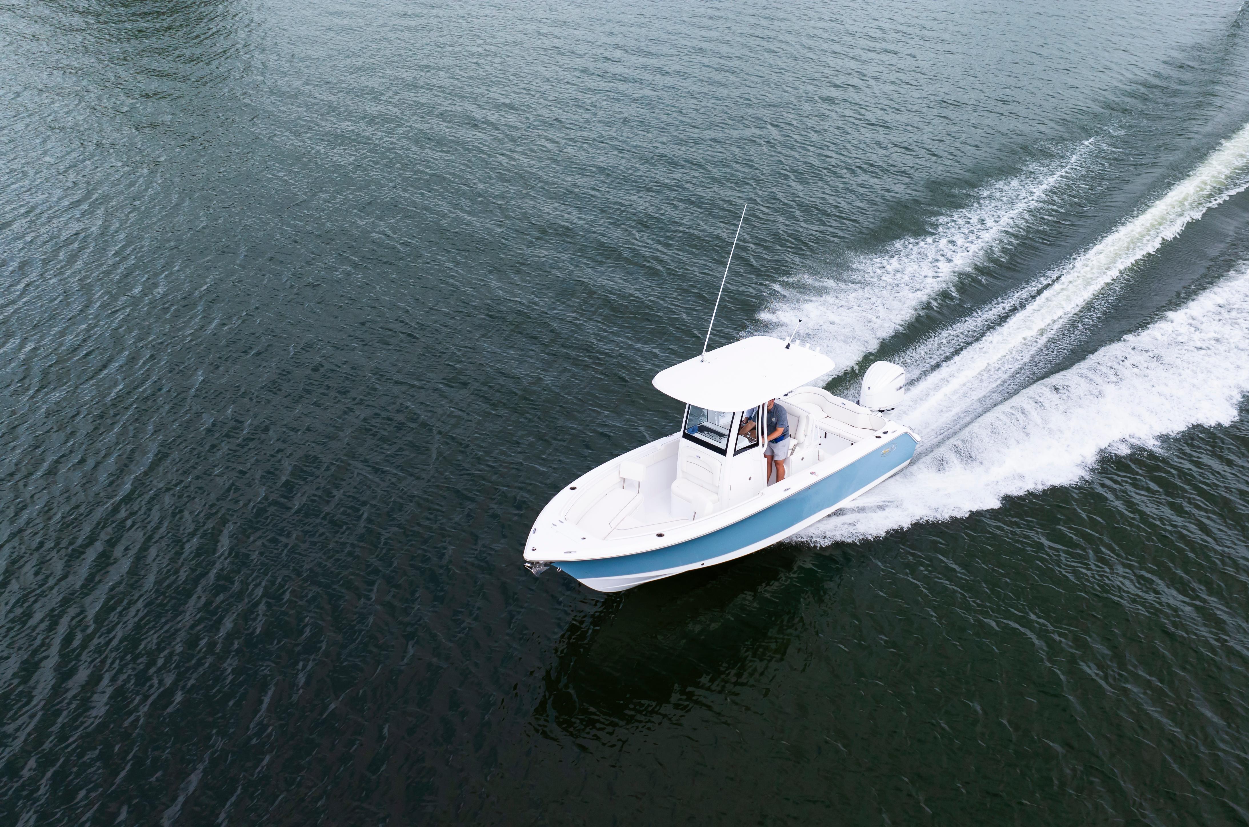 2026 Sea Hunt Ultra 245 SE boat cruising on open water.