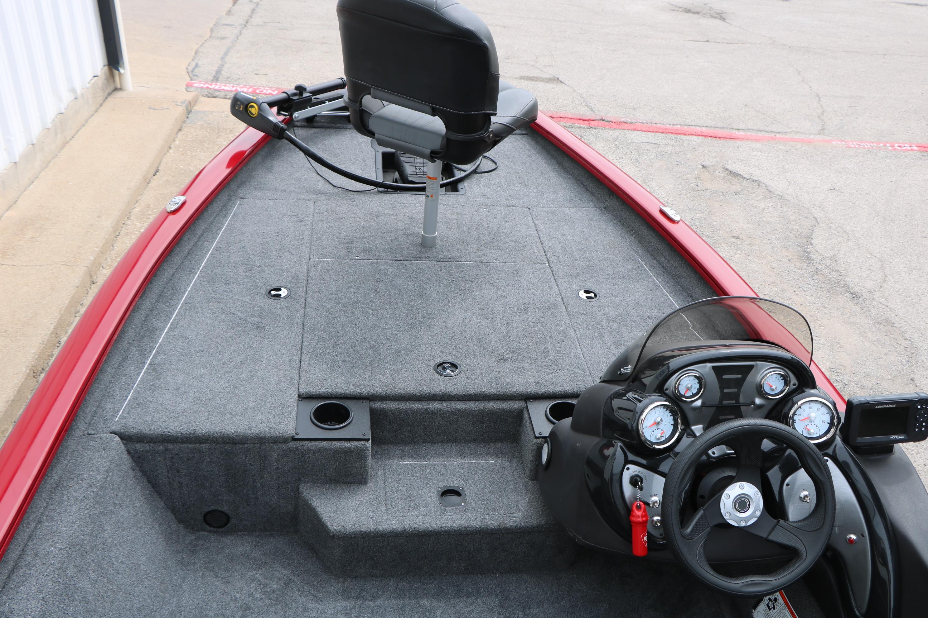 2024 Tracker Pro Team 175 boat interior with steering console and seating.