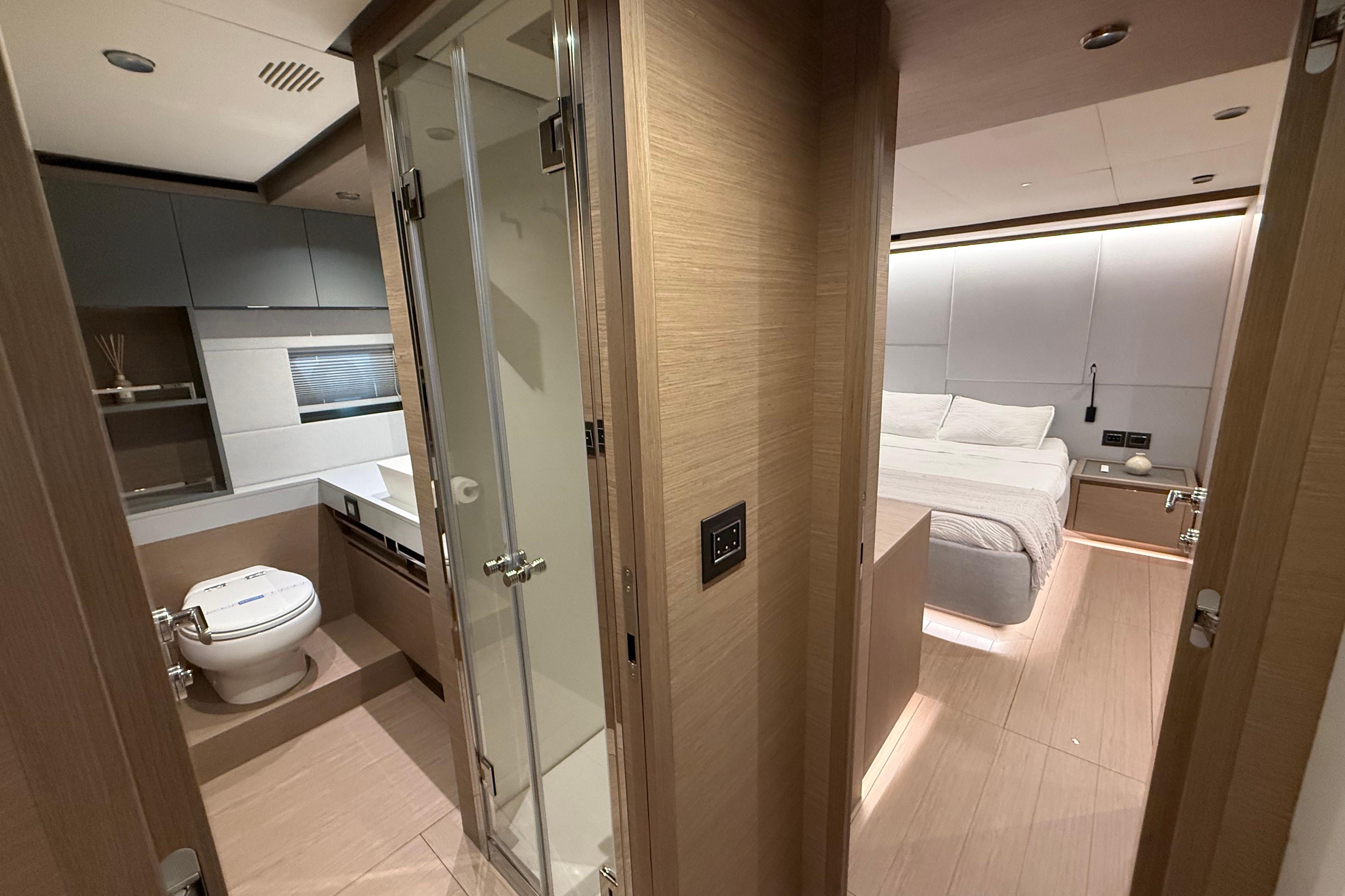 Luxurious interior of 2026 Pardo Yachts GT75 featuring bedroom and bathroom.