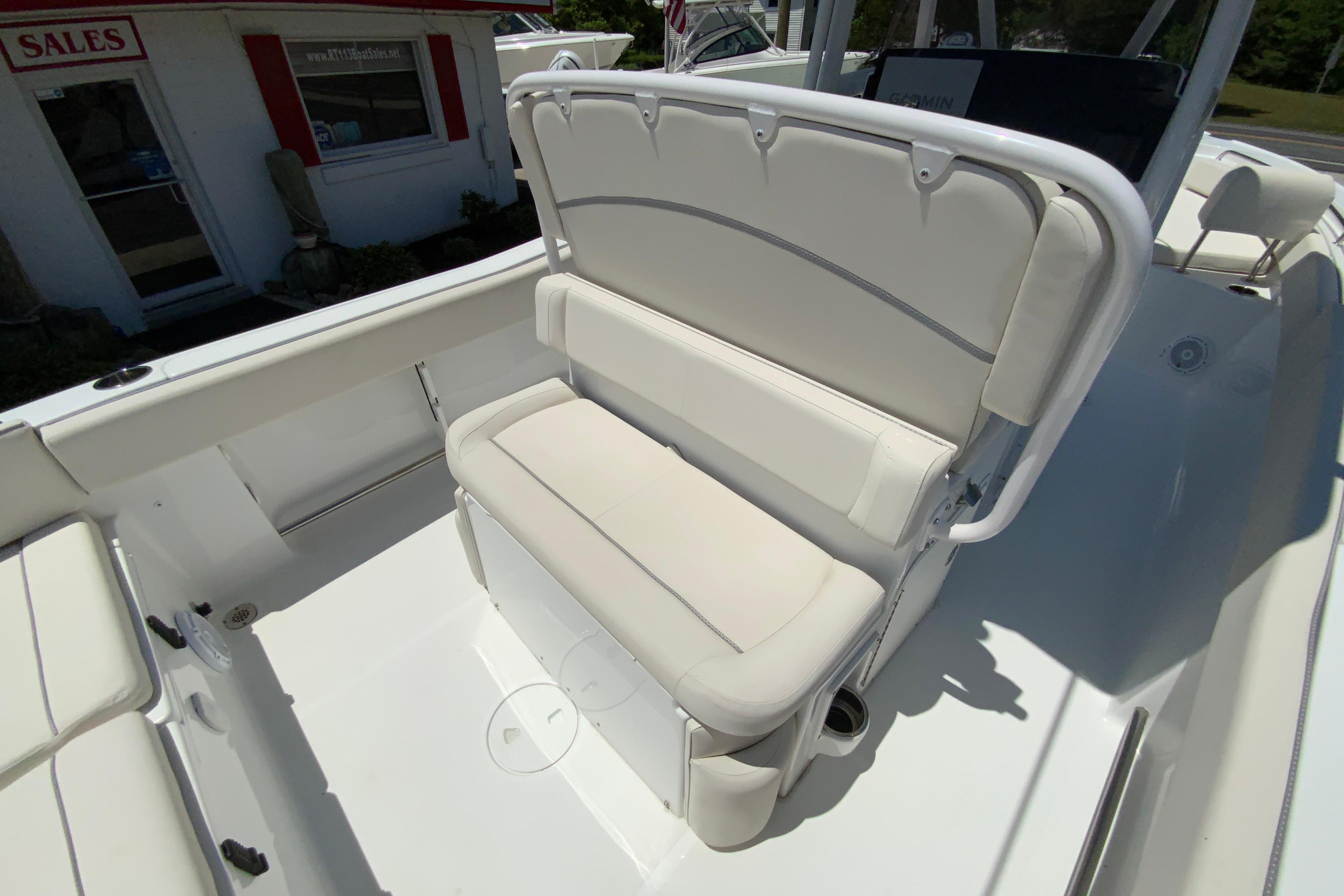 2024 Sea Hunt Ultra 234 boat interior with cushioned seating and sleek design.