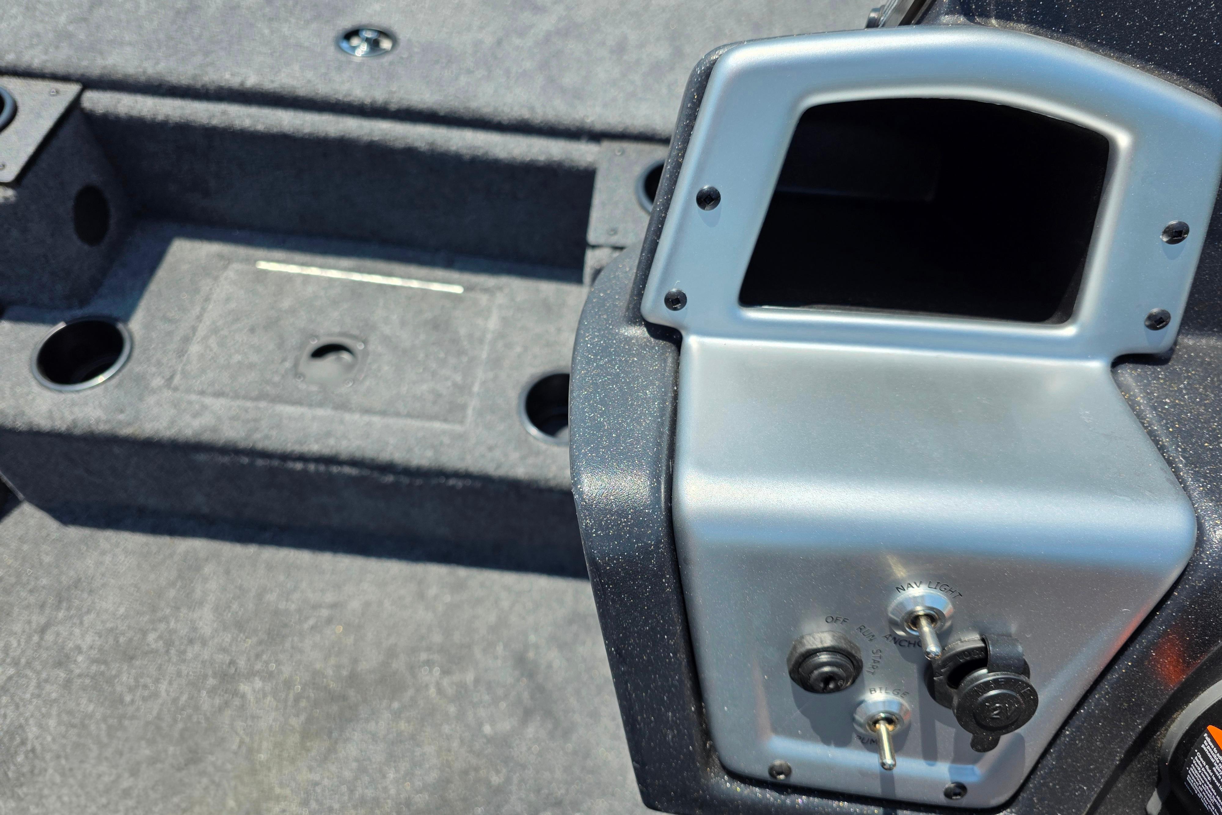 2026 Tracker Pro Team 195 boat interior with control panel and cup holders.