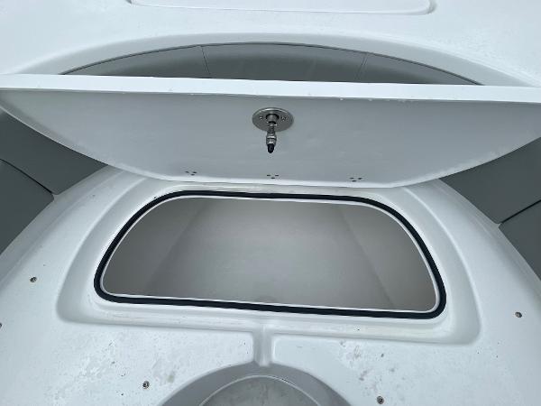 Open storage compartment on a 2026 Cape Horn 24XS boat.