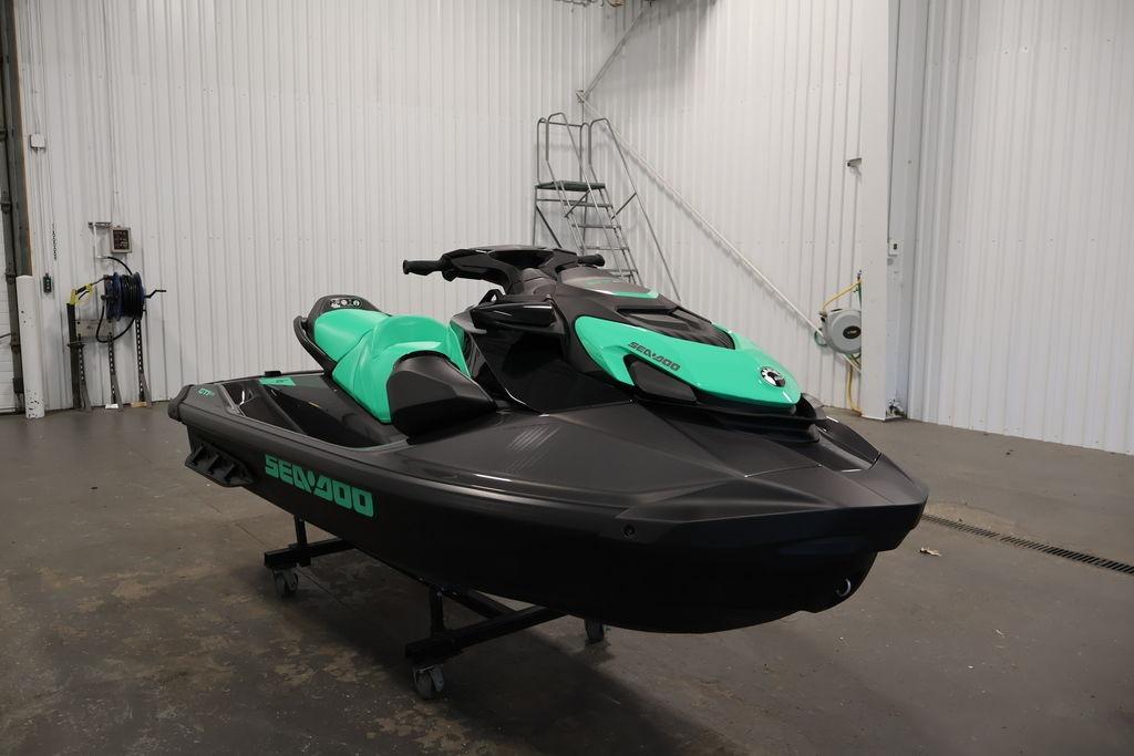 2026 Sea-Doo GTI SE 130 jet ski in a garage setting.