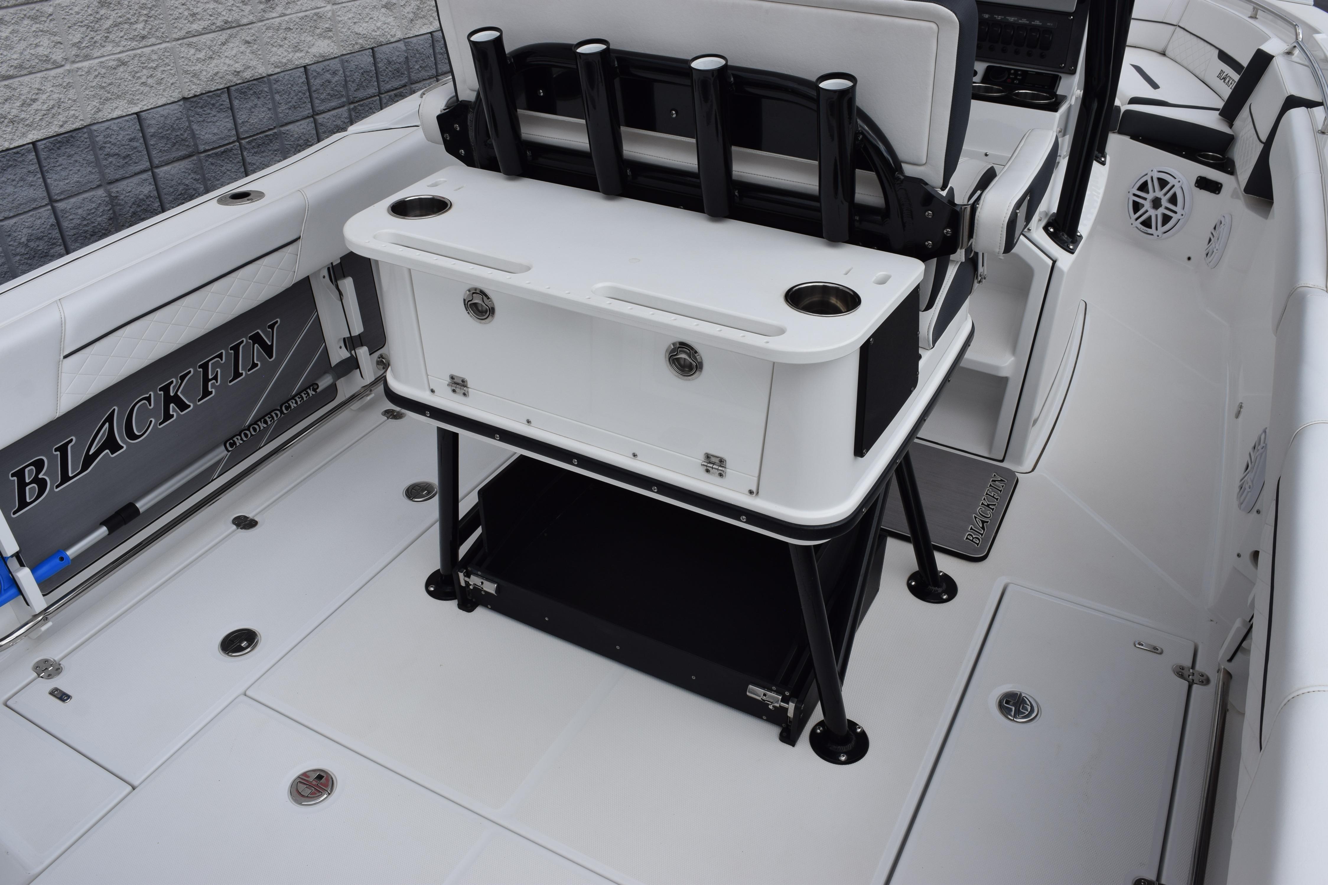 2023 Blackfin 252 CC boat interior with seating and storage features.