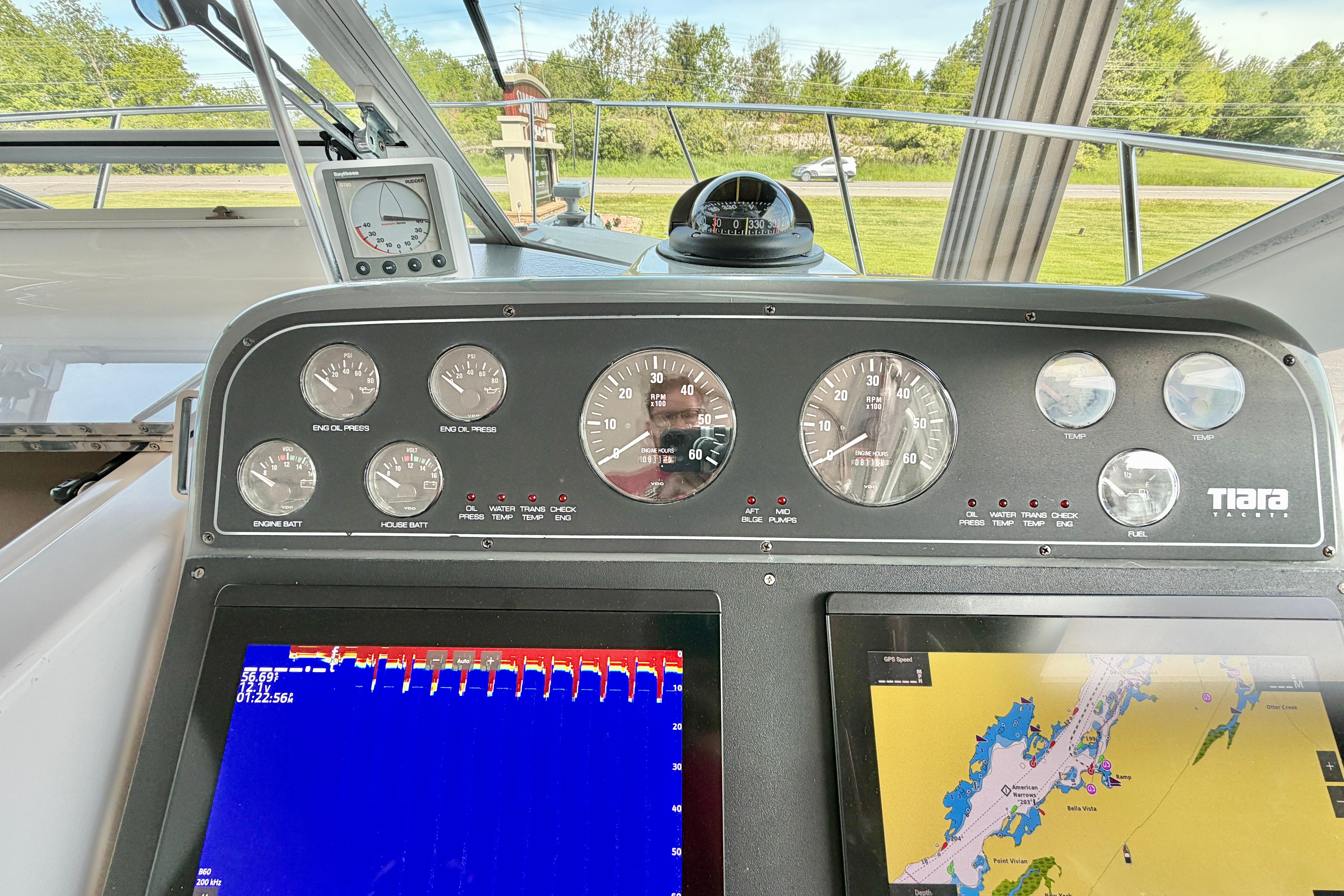 Dashboard of a 1999 Tiara Yachts 2900 Coronet with navigation and engine gauges.