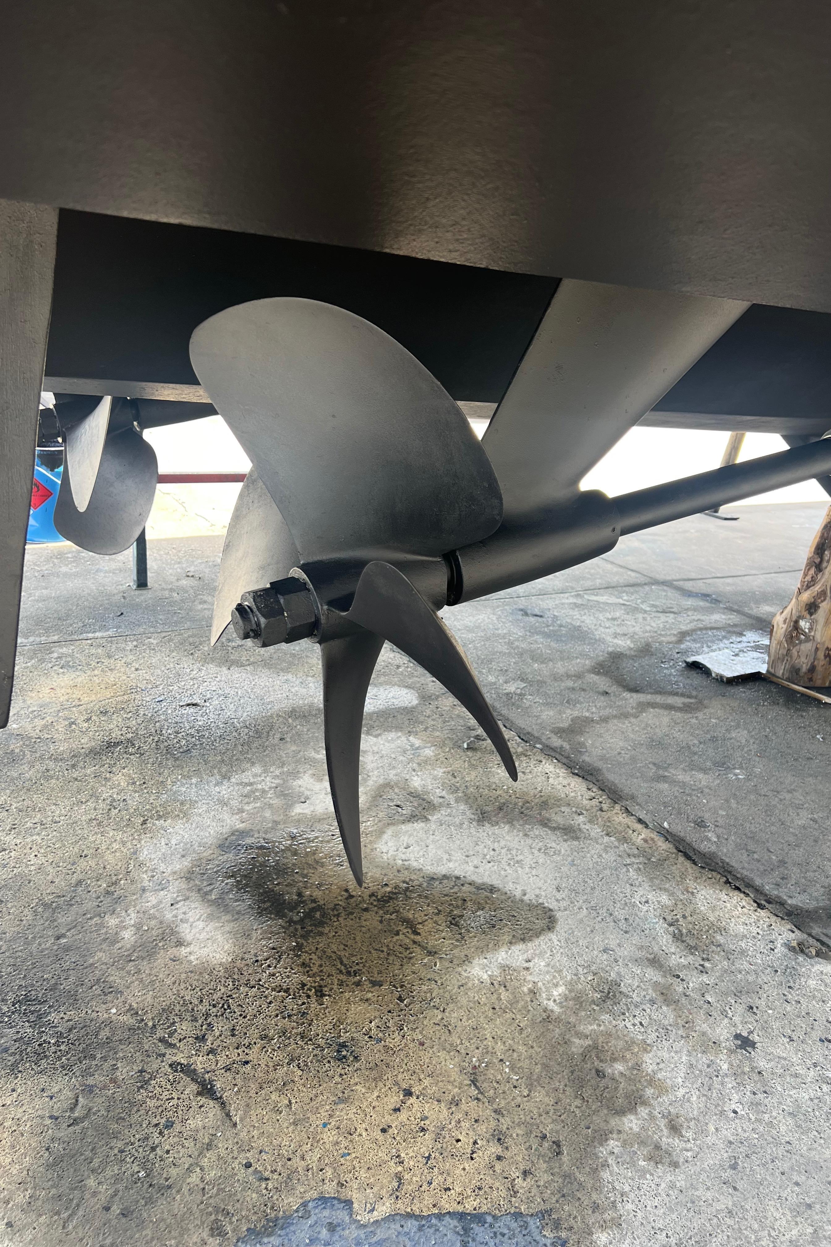 Propeller of 2008 Riviera 4700 Sport Yacht on dry dock.