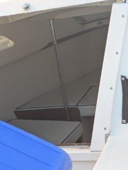 Interior of a 2002 Catalina Capri with blue cover.