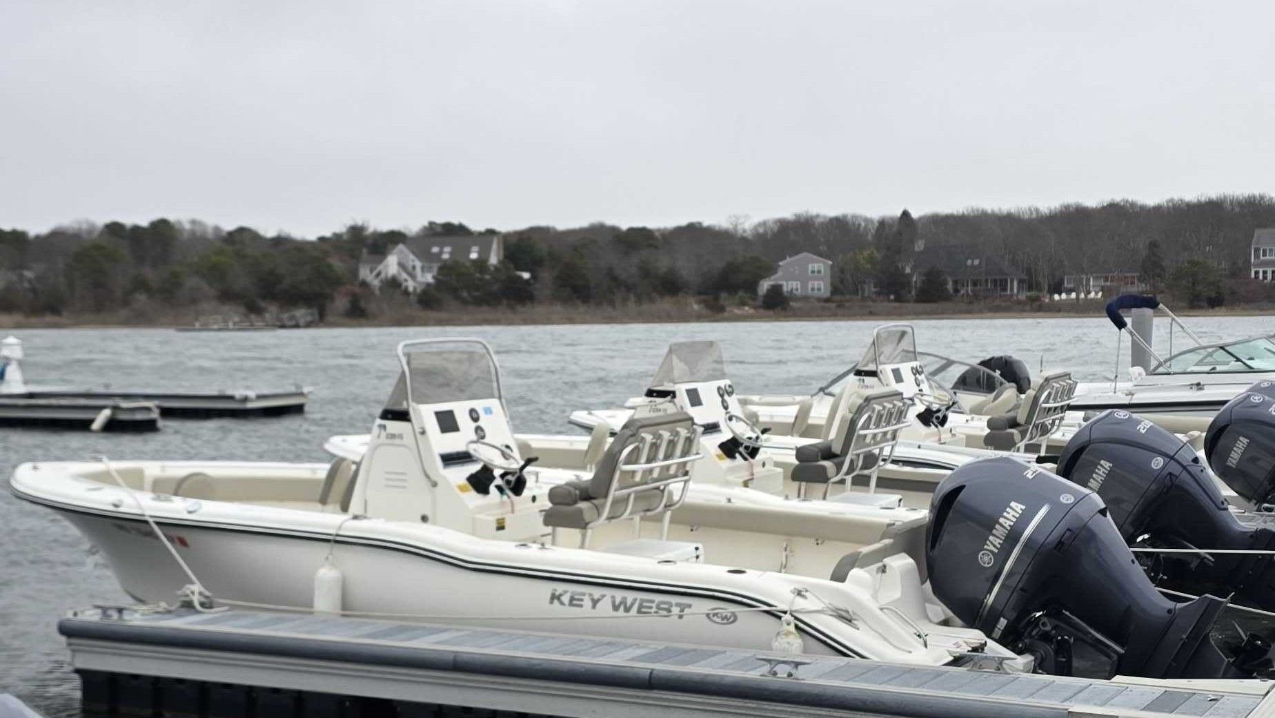 2024 Key West 239 FS boats docked with Yamaha engines.