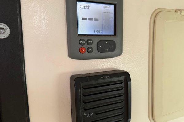 Depth gauge and speaker on Reliance 44, 2011 model, displaying depth in feet.