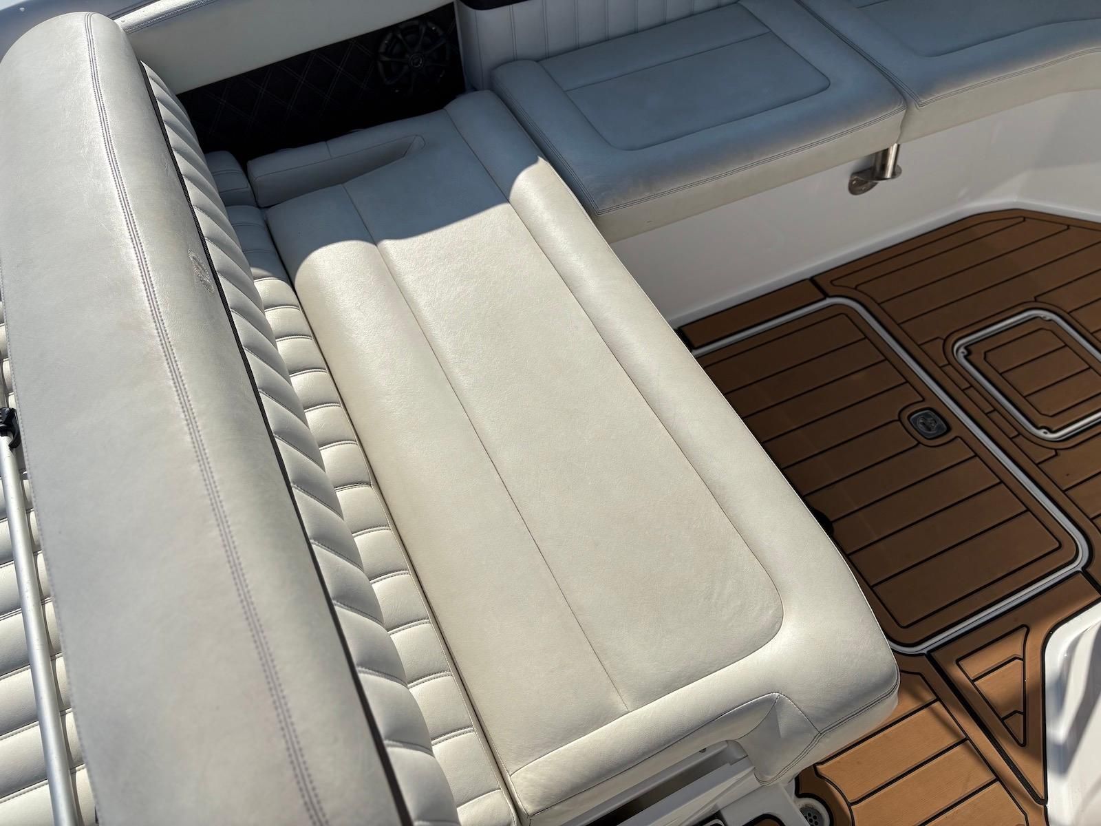 Interior of a 2012 Cobalt A28 boat with leather seating.