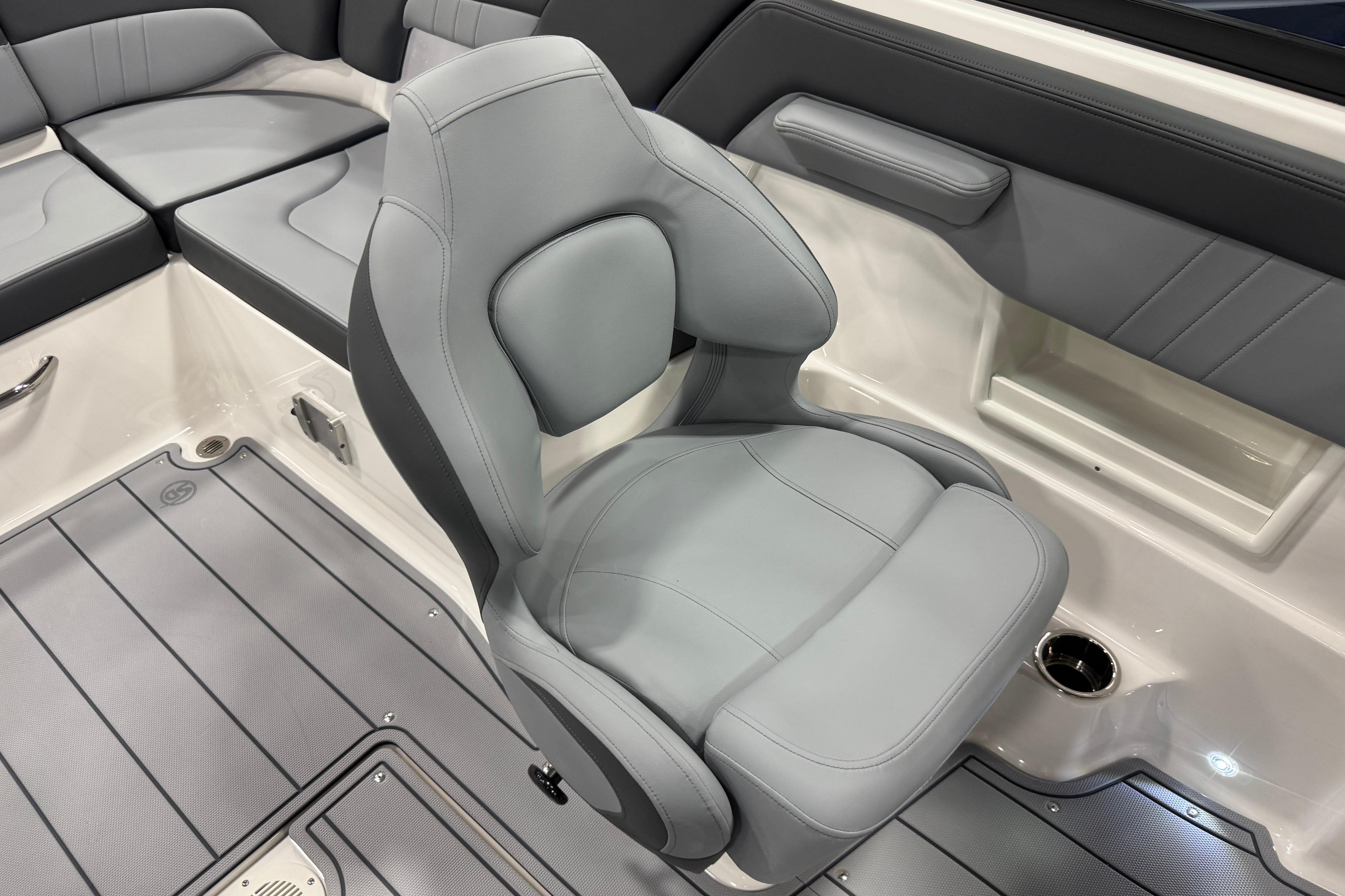 2026 Chaparral 23 SSi boat interior with gray seating and modern design.