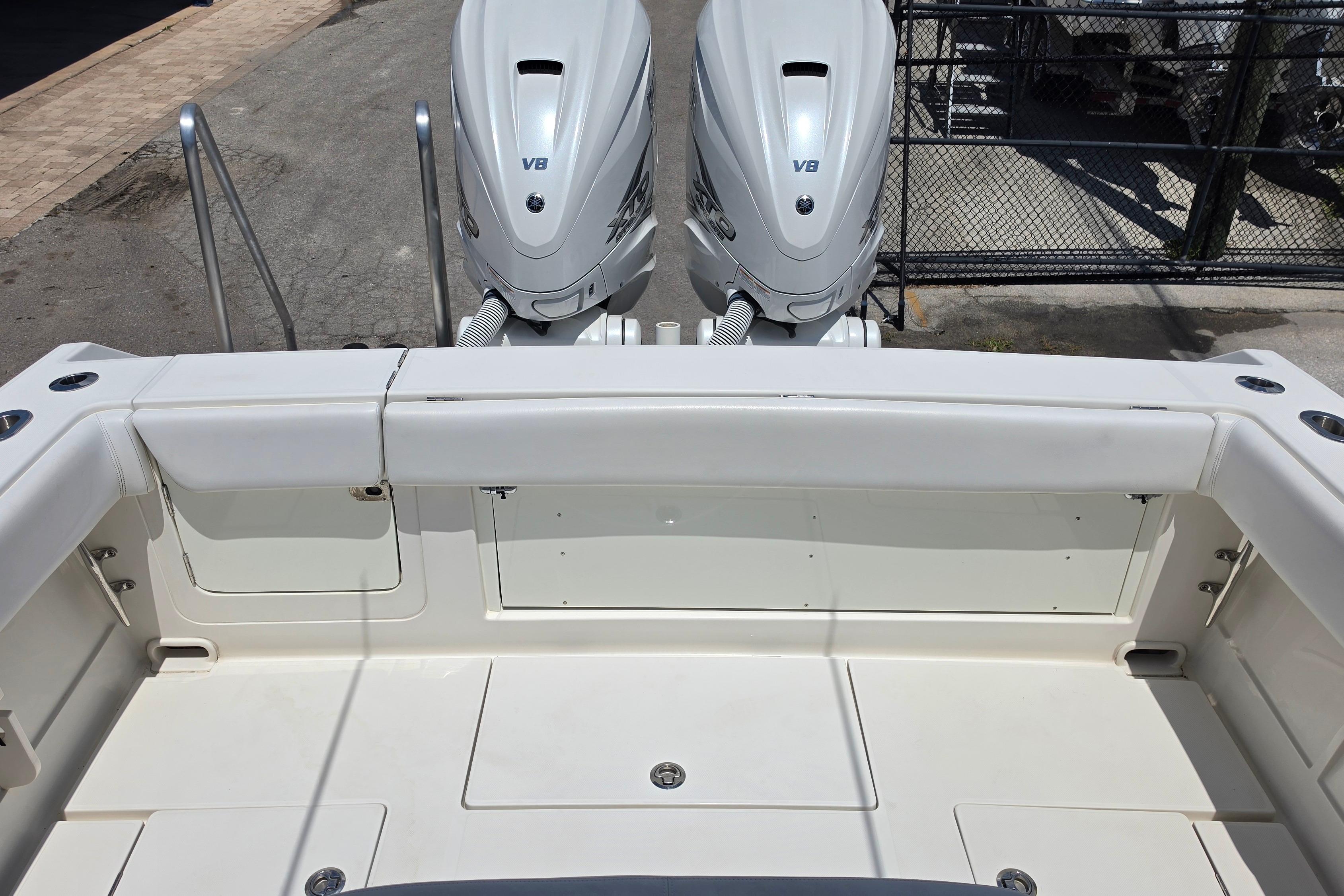 2020 Jupiter 34 HFS boat with dual V8 engines, rear deck view.