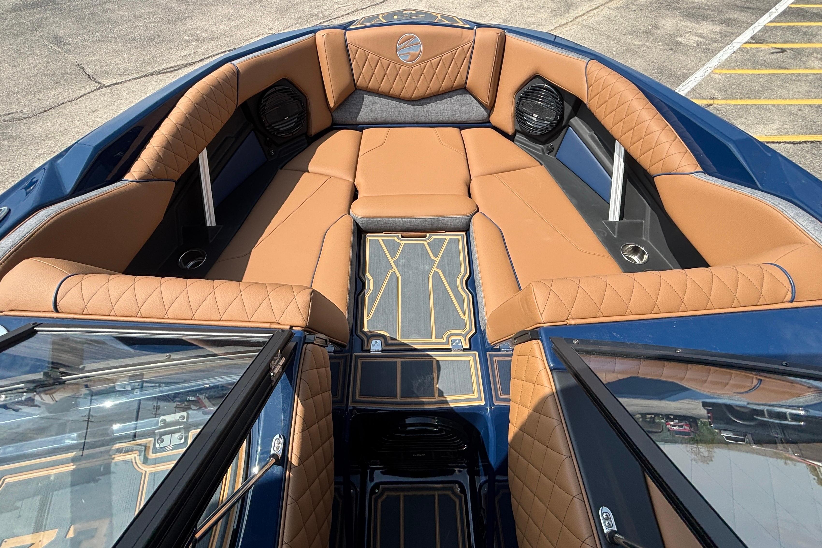 Luxurious interior of 2026 Tigé Z3 boat with tan leather seating and modern design.