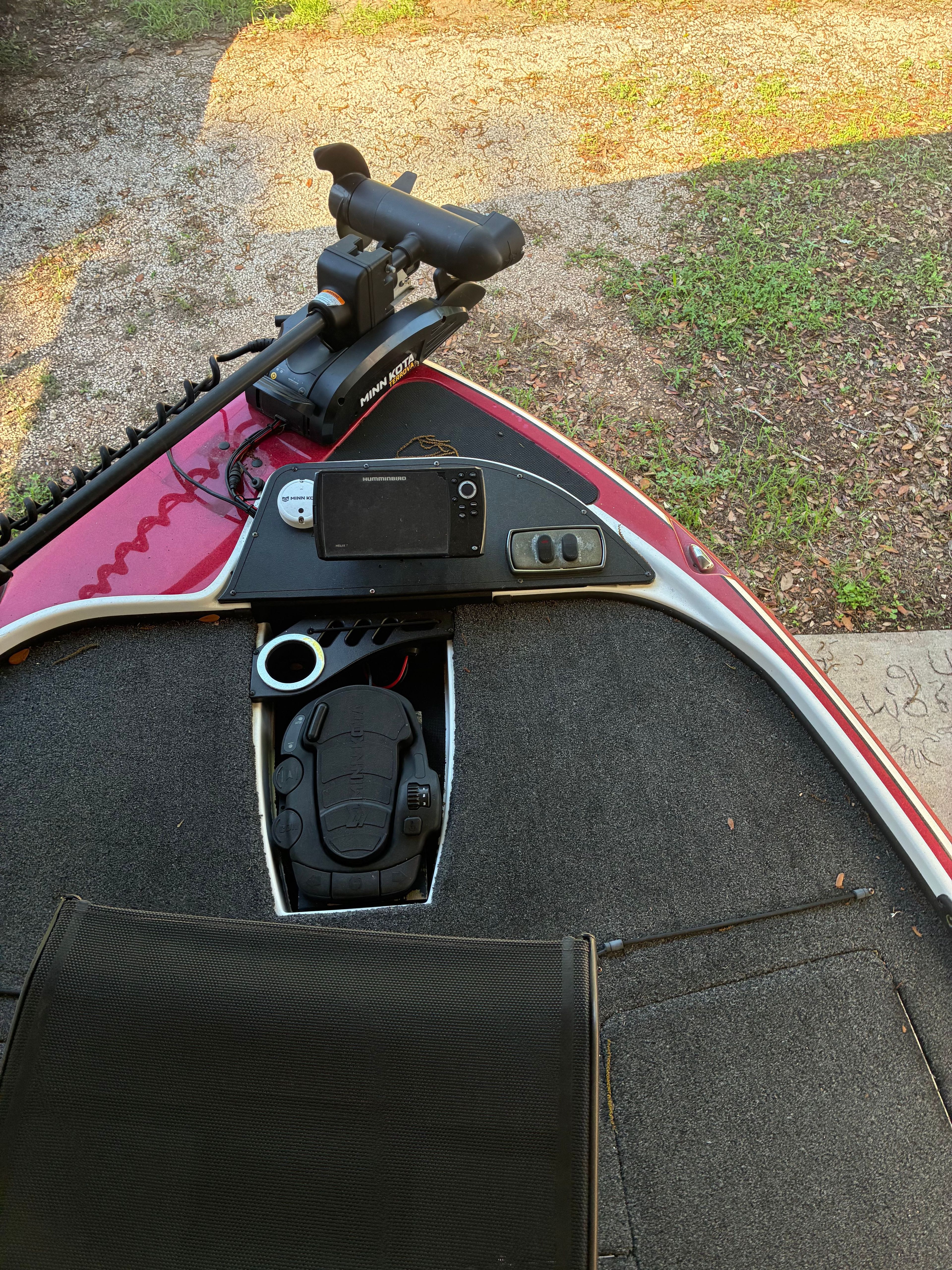 The deck of a Nitro Z18 boat with fishing gear and electronics.