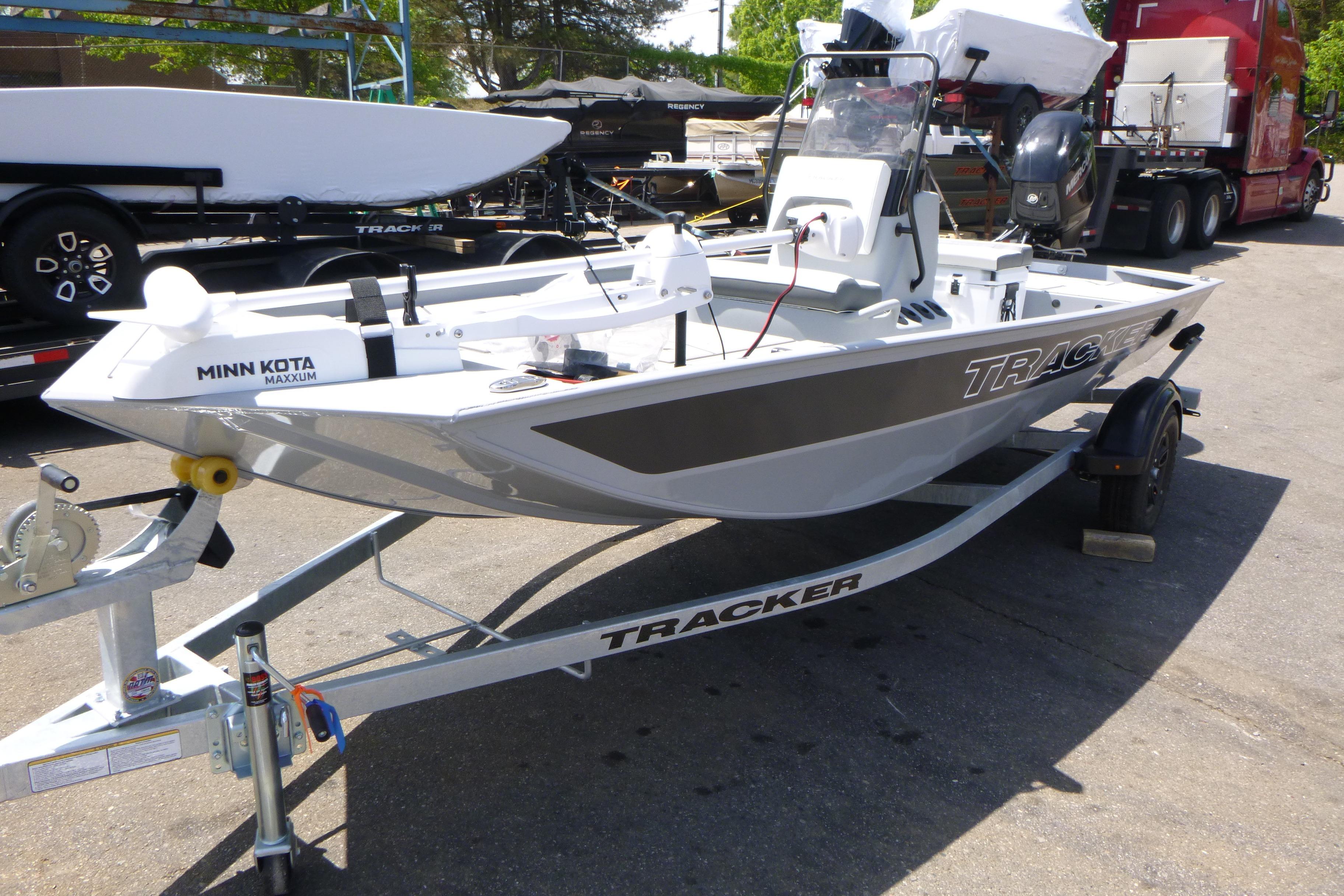 2026 Tracker Bass Tracker Classic CC boat on trailer, featuring Minn Kota Maxxum motor.