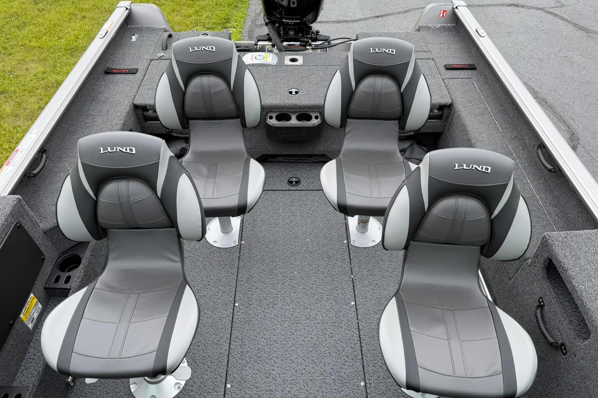2027 Lund 1875 Impact XS Sport boat interior with four gray seats.