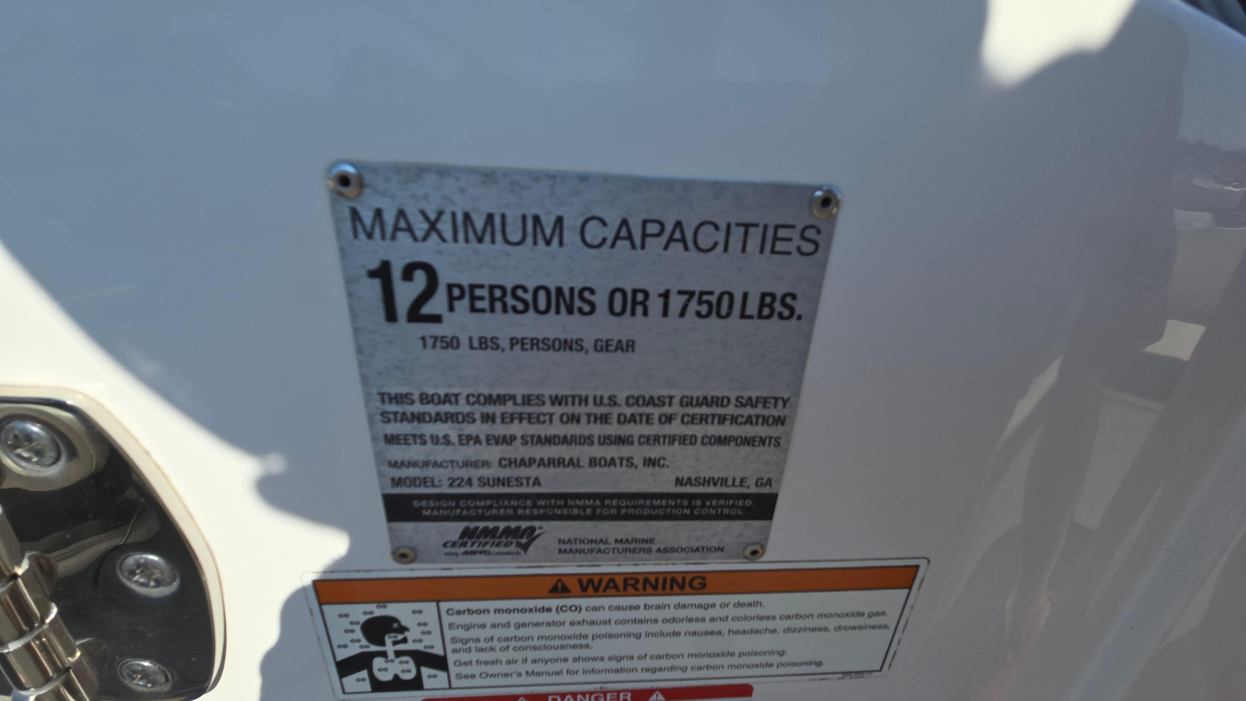 2018 Chaparral 224 Sunesta capacity plate, 12 persons or 1750 lbs, safety compliance details.