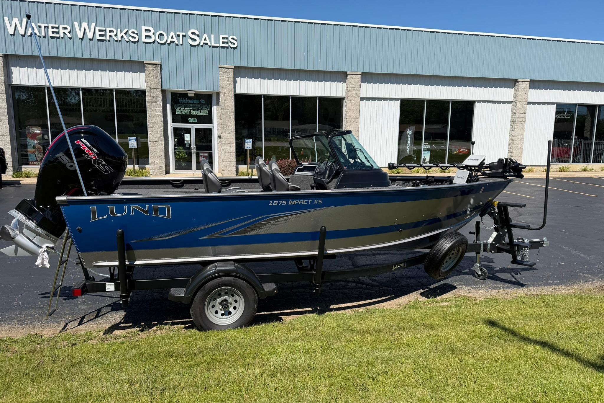2024 Lund 1875 Impact XS Sport boat on trailer at Water Werks Boat Sales.