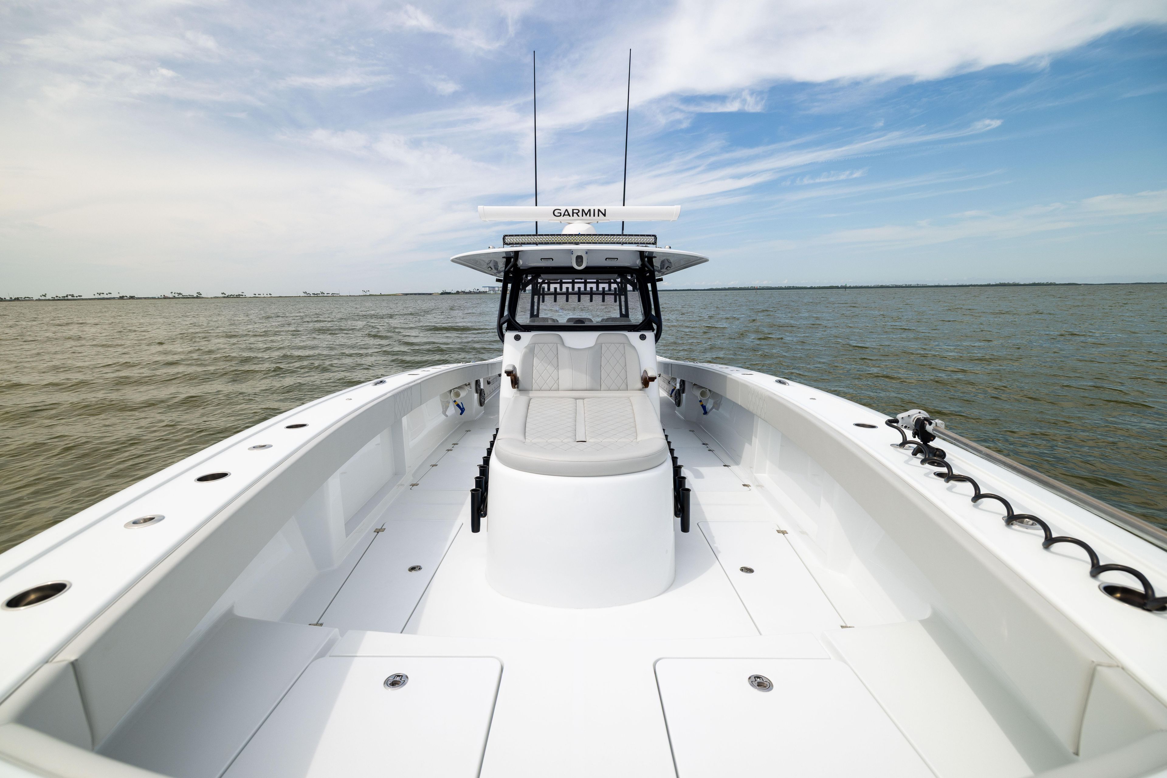 2025 Freeman 42 LR boat on open water, featuring spacious deck and modern design.