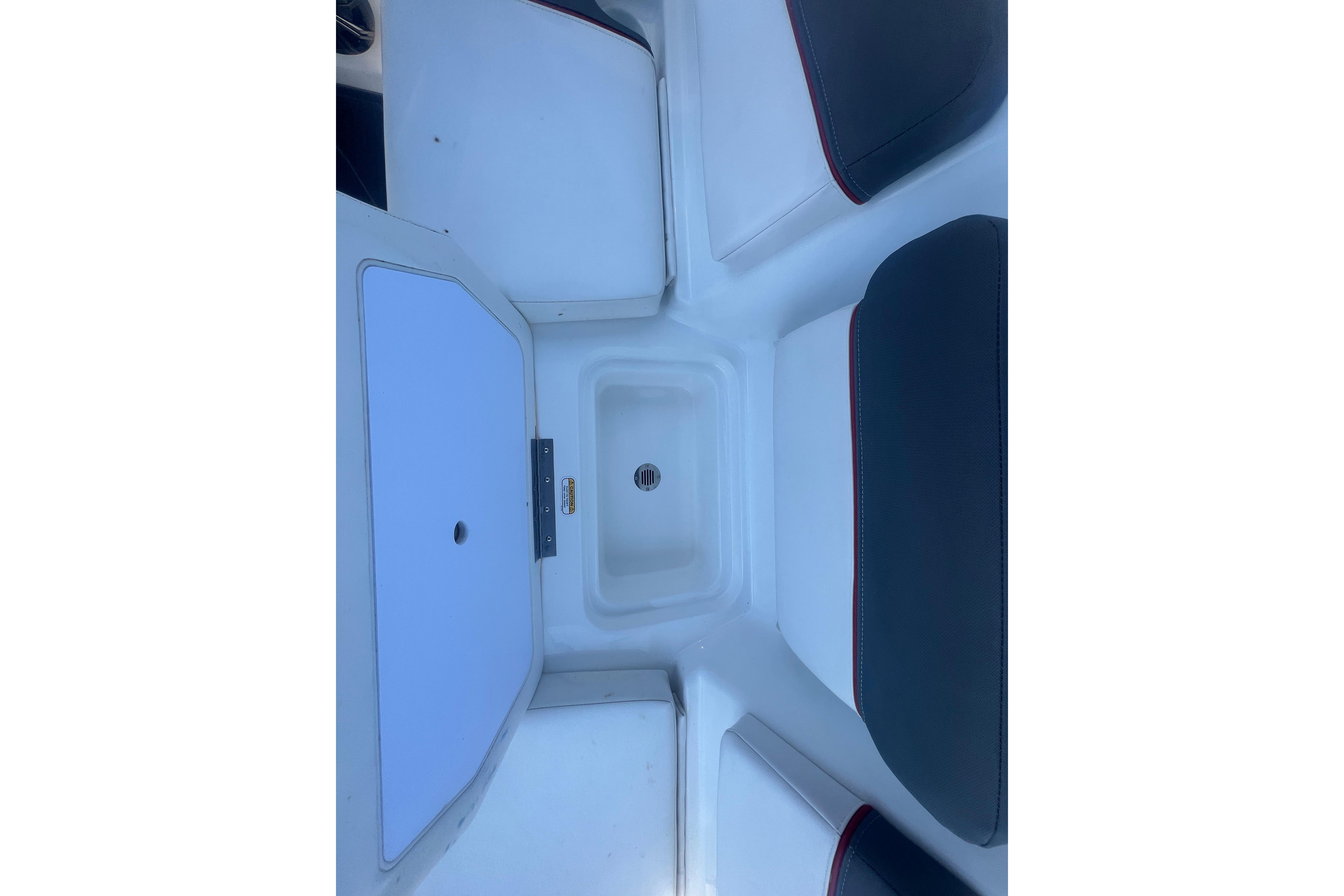 2023 Tahoe T16 boat interior with seating and storage compartments.