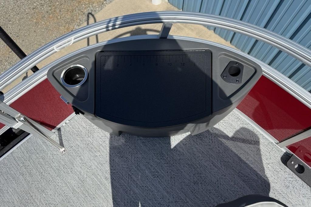 2026 Sun Tracker Bass Buggy 18 DLX boat deck with cup holder and measuring board.