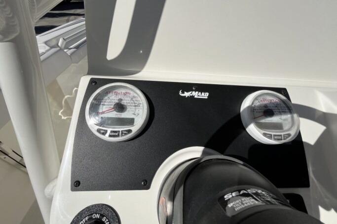 2025 Mako 214 Center Console dashboard with gauges and steering wheel.