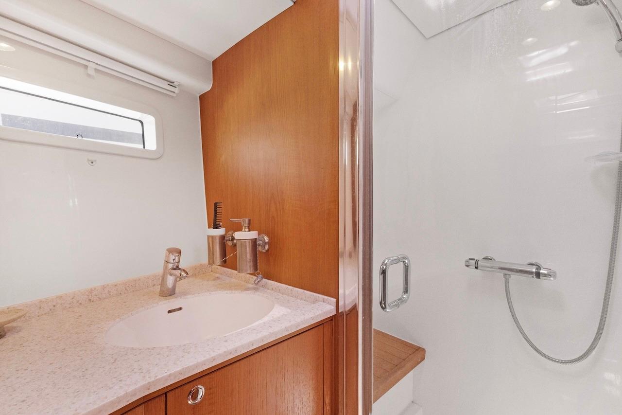 Luxurious bathroom in 2011 Southerly 57 RS yacht with modern fixtures and shower.