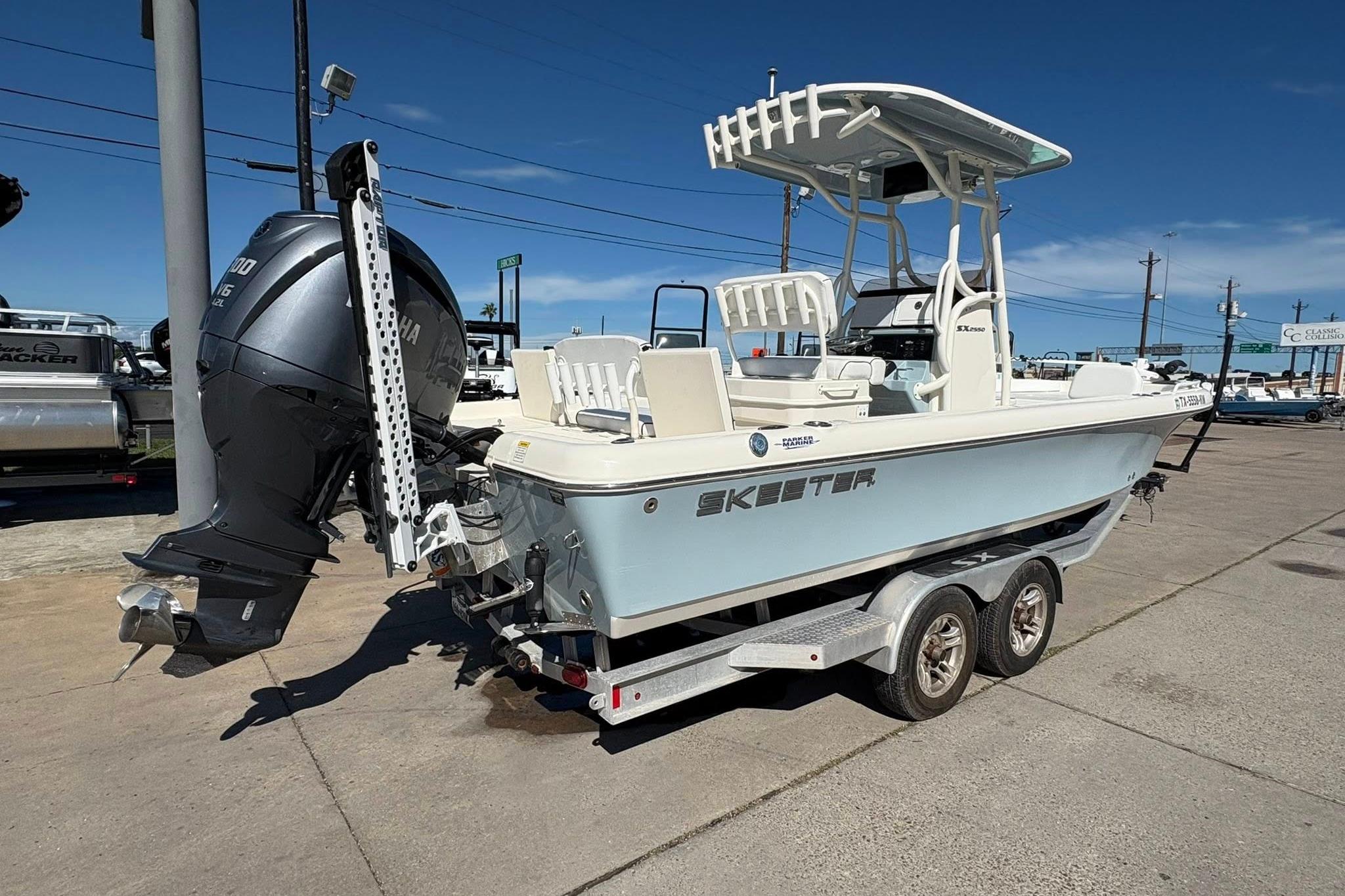2023 Skeeter SX2550 Family boat on trailer with Yamaha outboard motor.