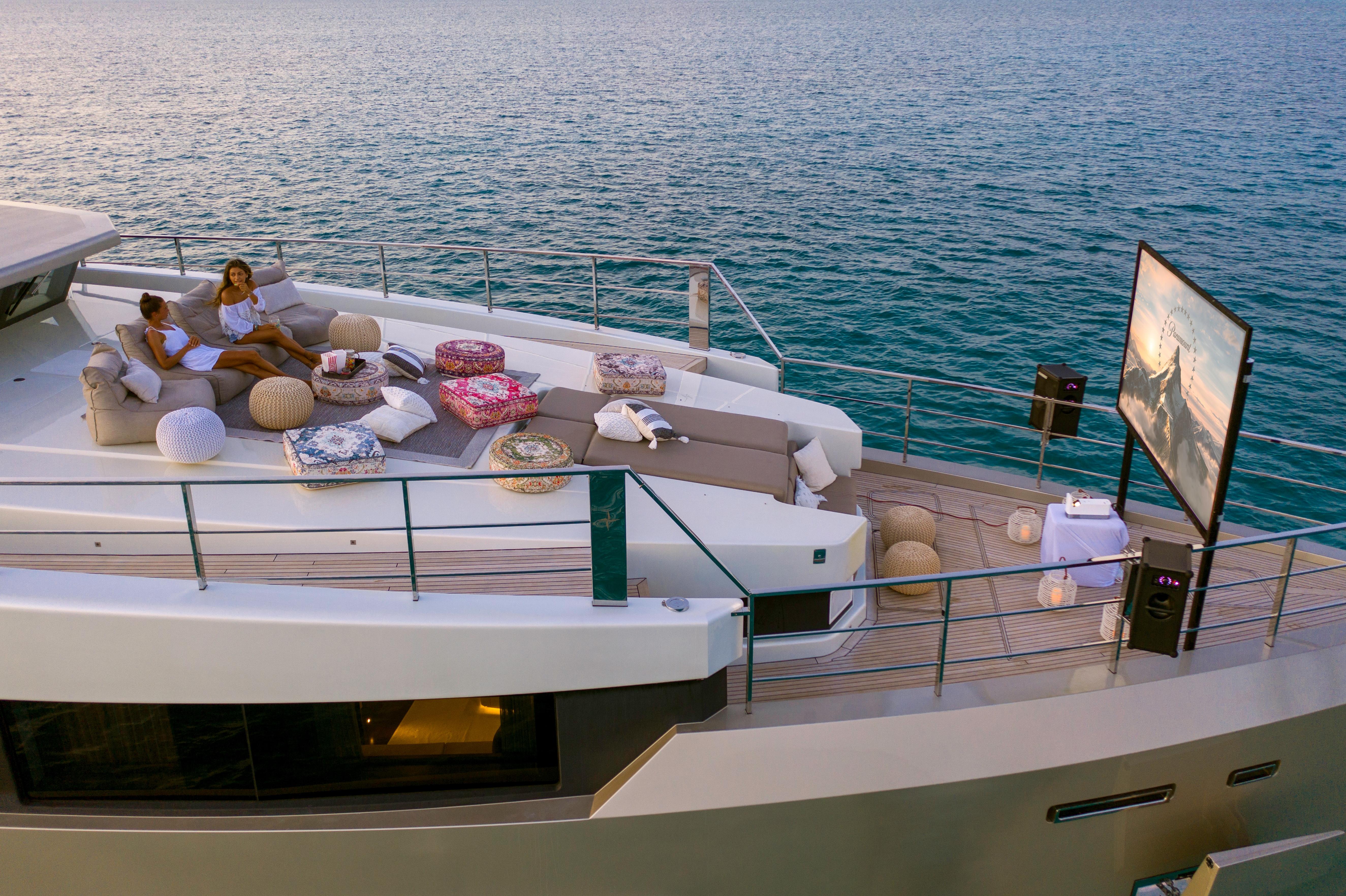 Luxurious 2015 Admiral Custom yacht with outdoor lounge and sea view.