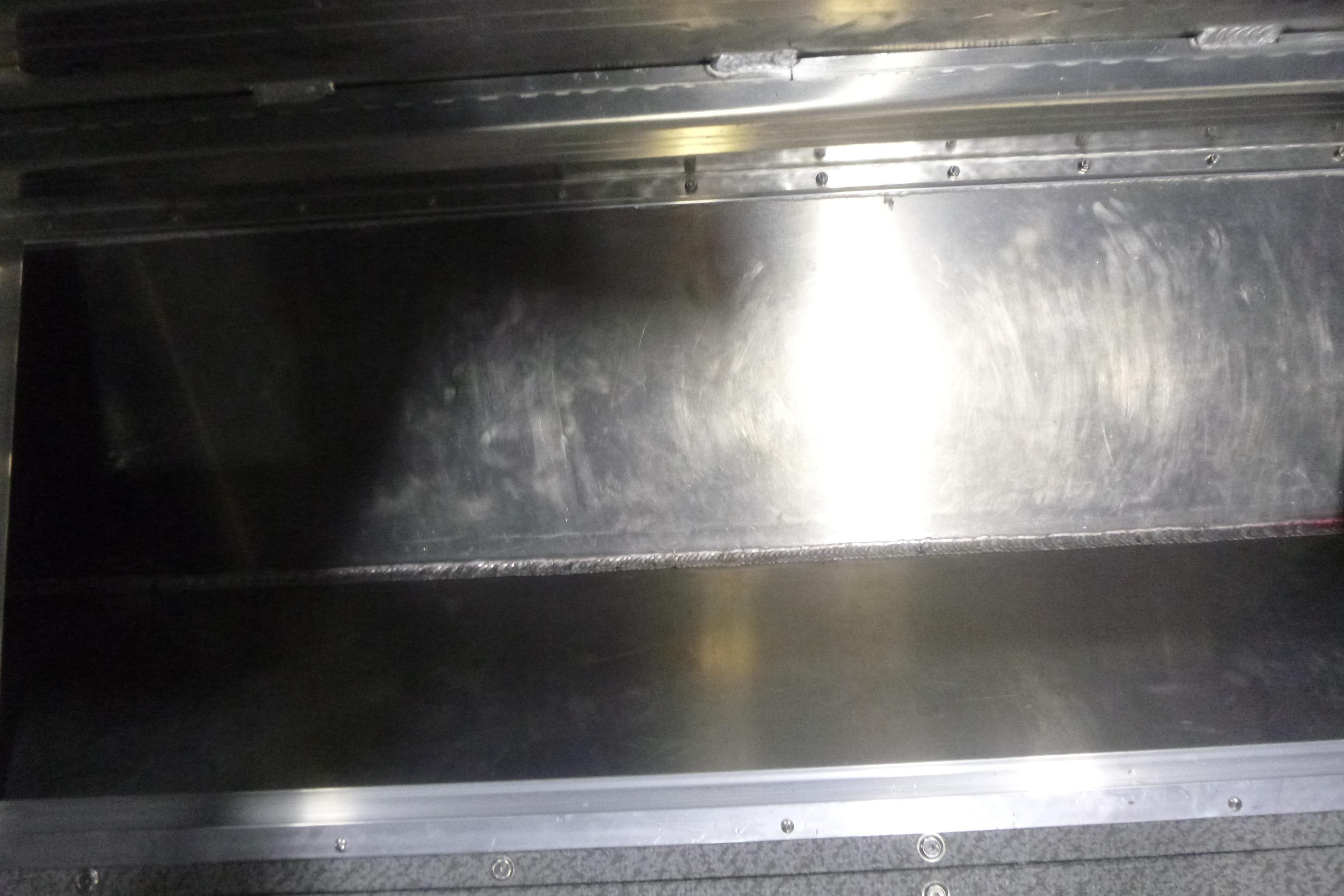 Interior storage compartment of 2026 KingFisher 2425 Escape HT boat.