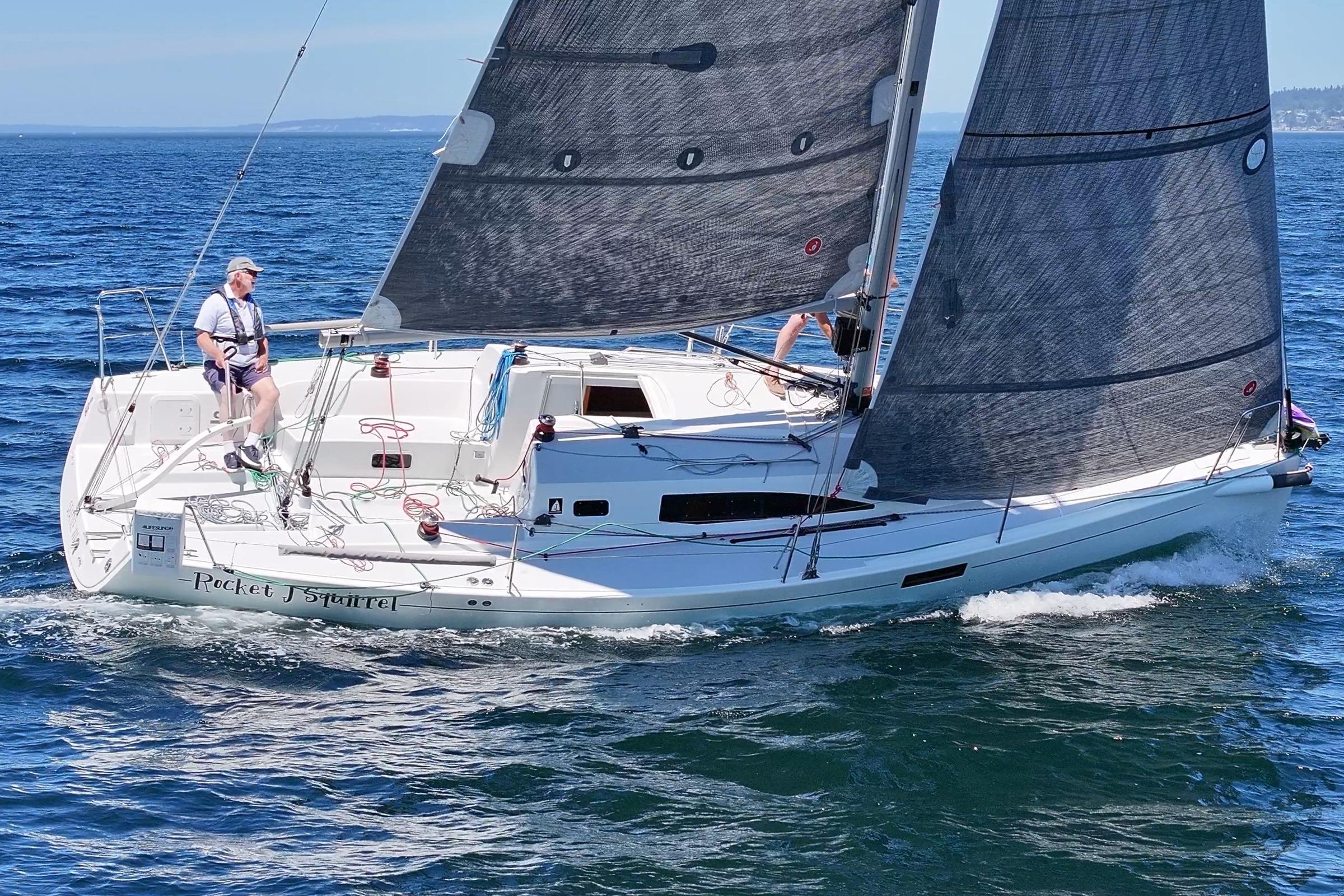 2018 J Boats J/97E sailing on open water with crew onboard.
