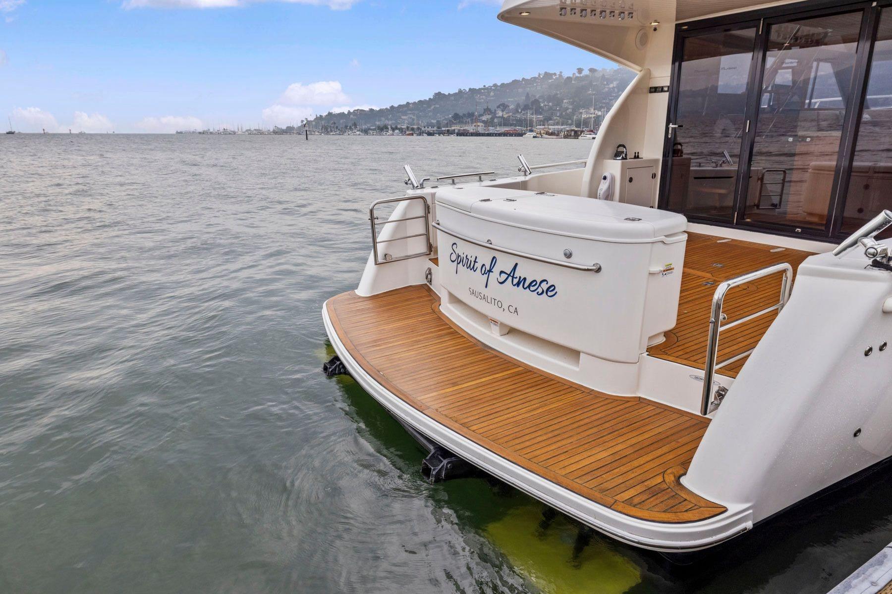 2014 Maritimo M50 yacht with wooden deck, docked in Sausalito, California.