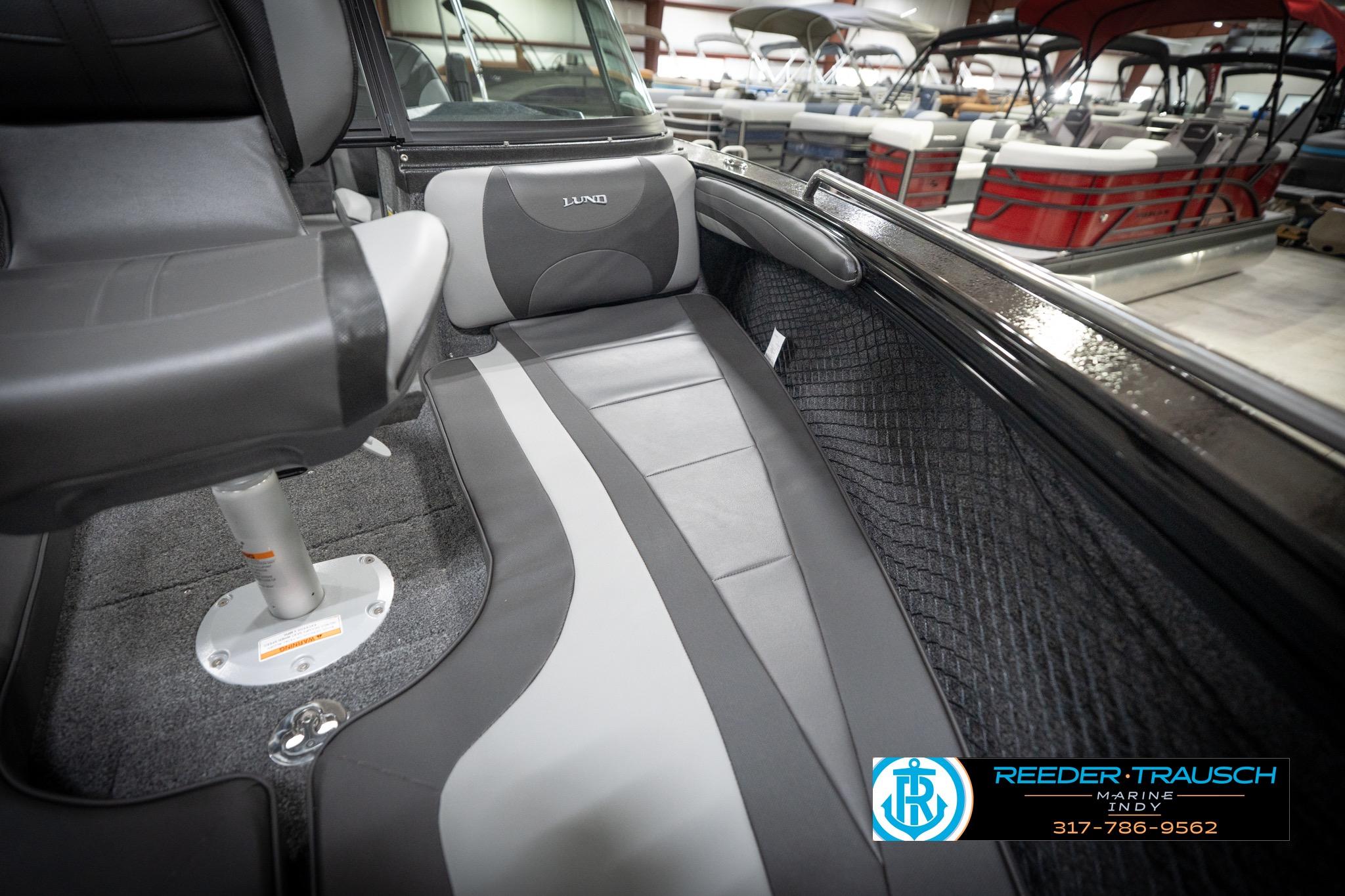 2026 Lund 2275 Baron boat interior with gray seating and sleek design.