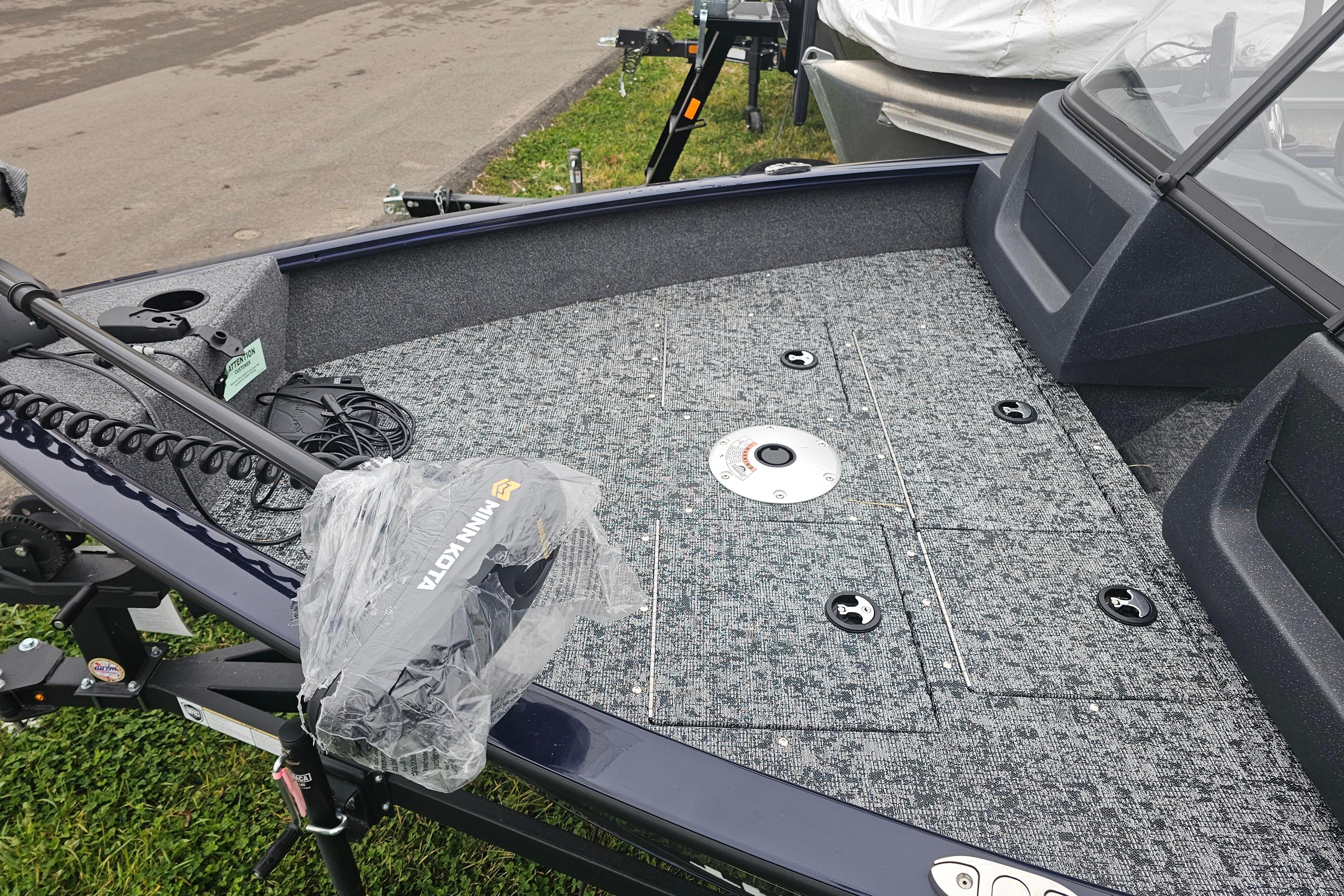 2025 Tracker Pro Guide V-16 WT boat interior with Minn Kota trolling motor.