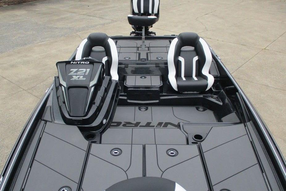 2026 Tracker Pro Guide V-16 WT boat interior with sleek black and white seating.