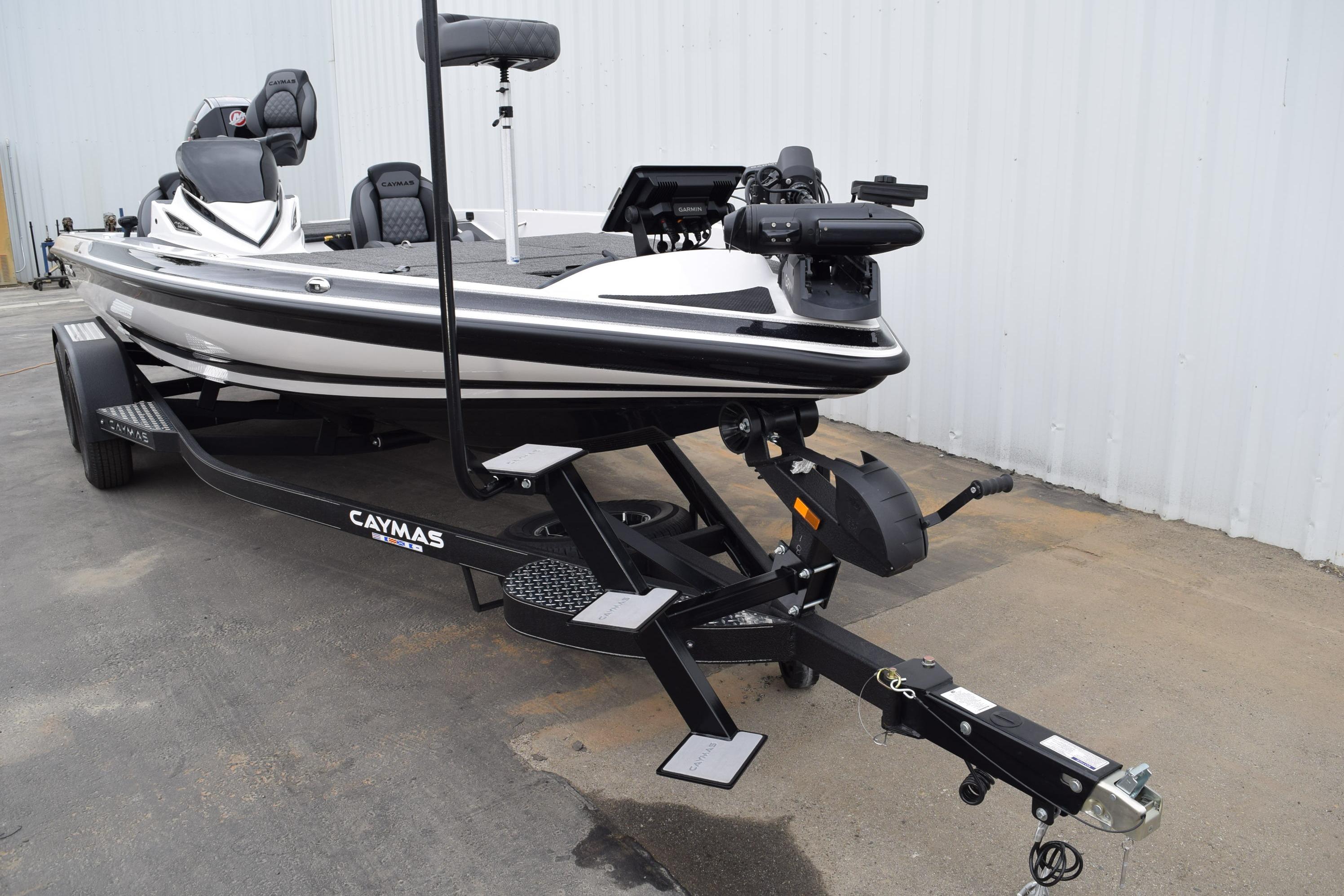 2027 Cayams CX 20 Pro boat on trailer, parked outdoors.