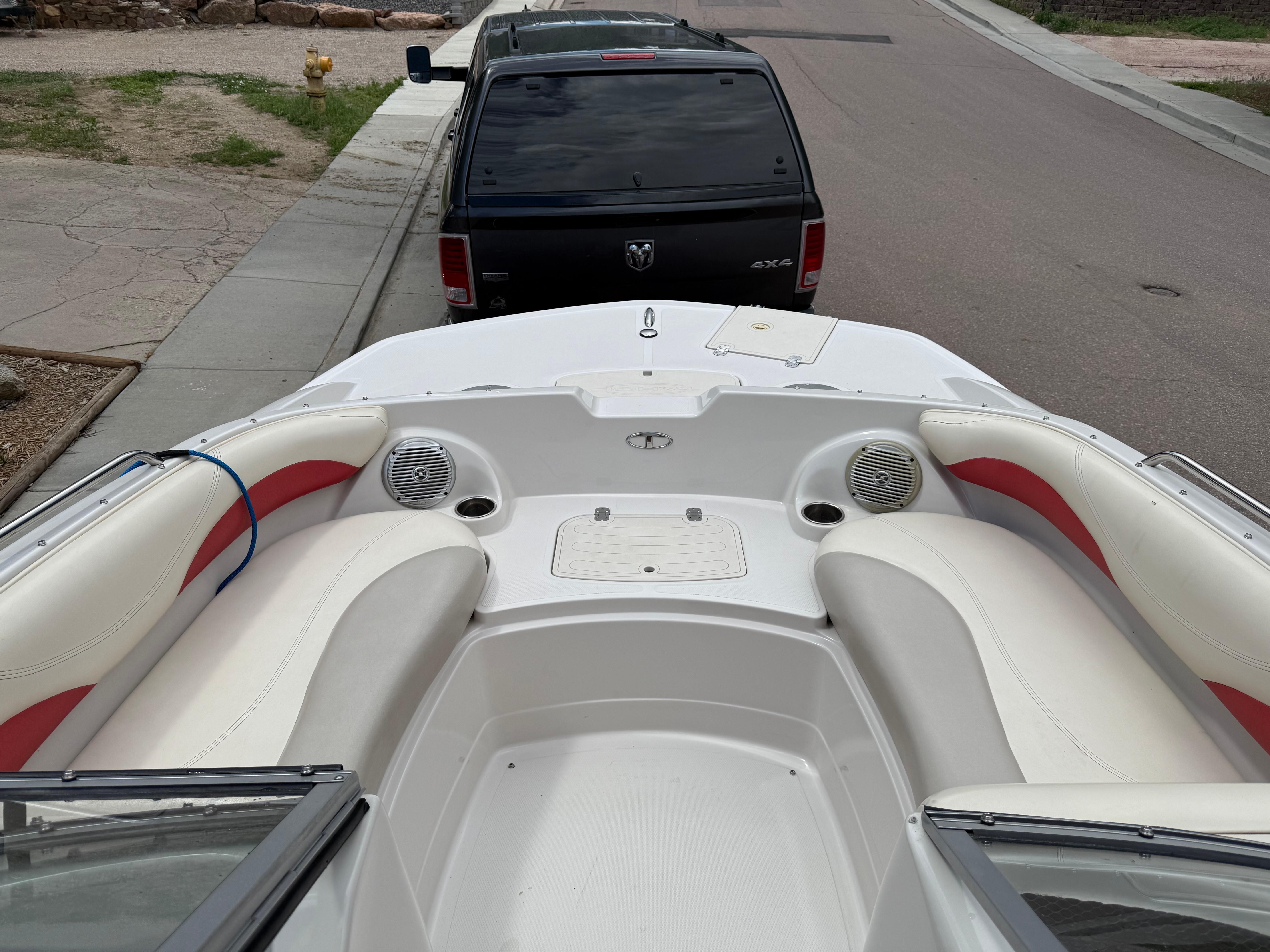 2011 Tahoe 216 WT boat parked on a trailer.
