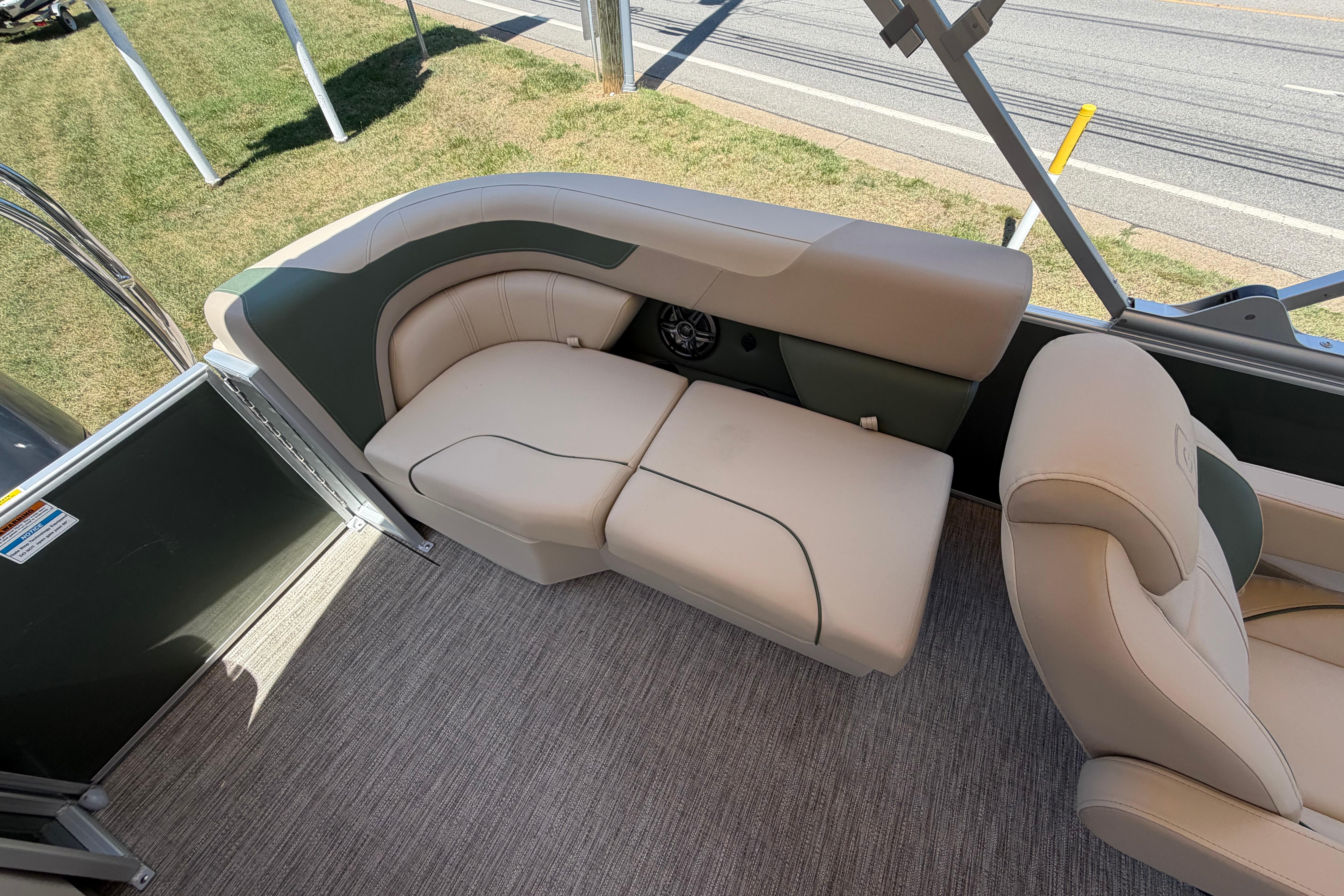 Luxurious seating on 2026 Godfrey SW 2086 SBC boat, featuring beige upholstery and modern design.