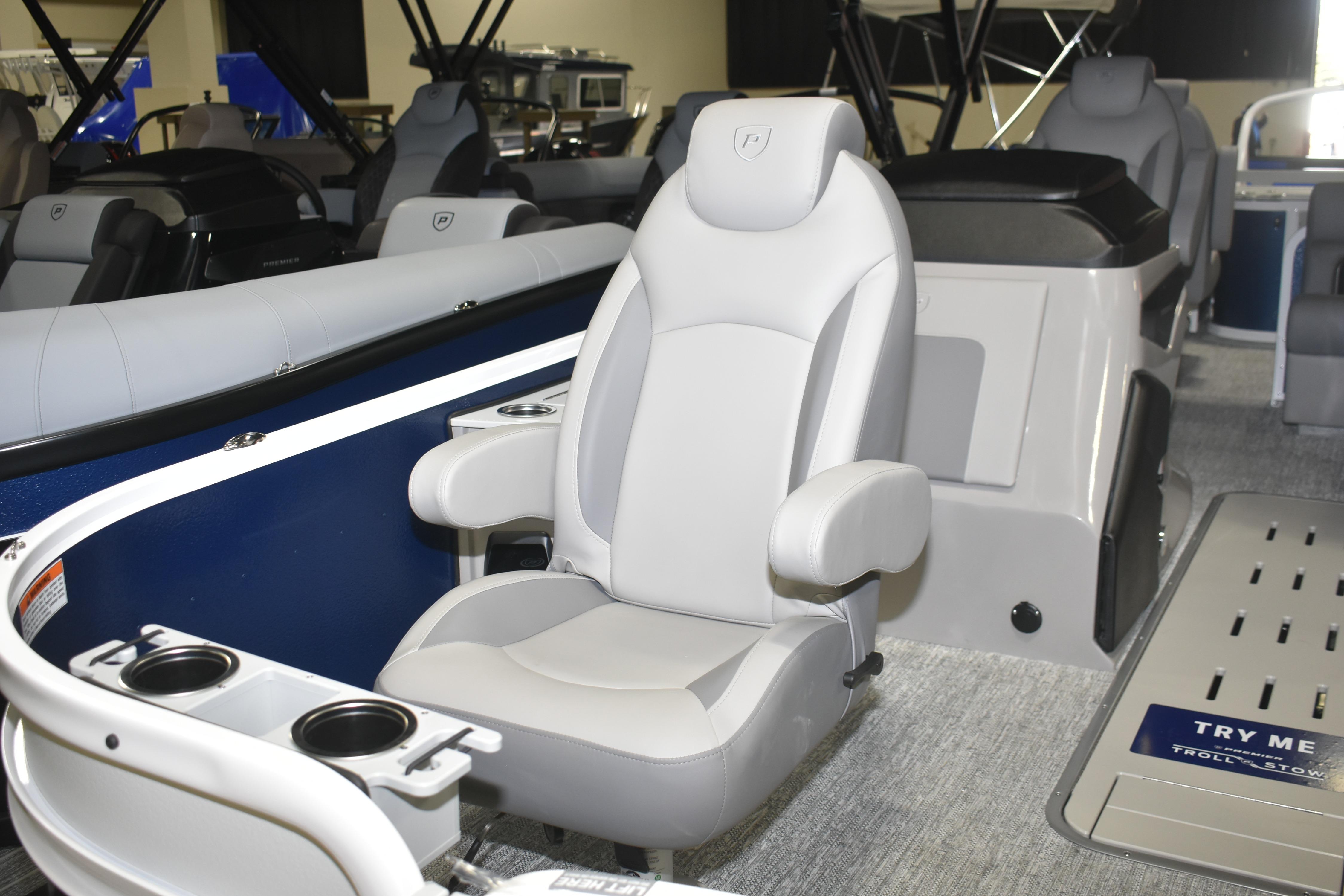 Luxurious seating on 2026 Premier 230 Sunsation Angler 4PT - PTX pontoon boat interior.