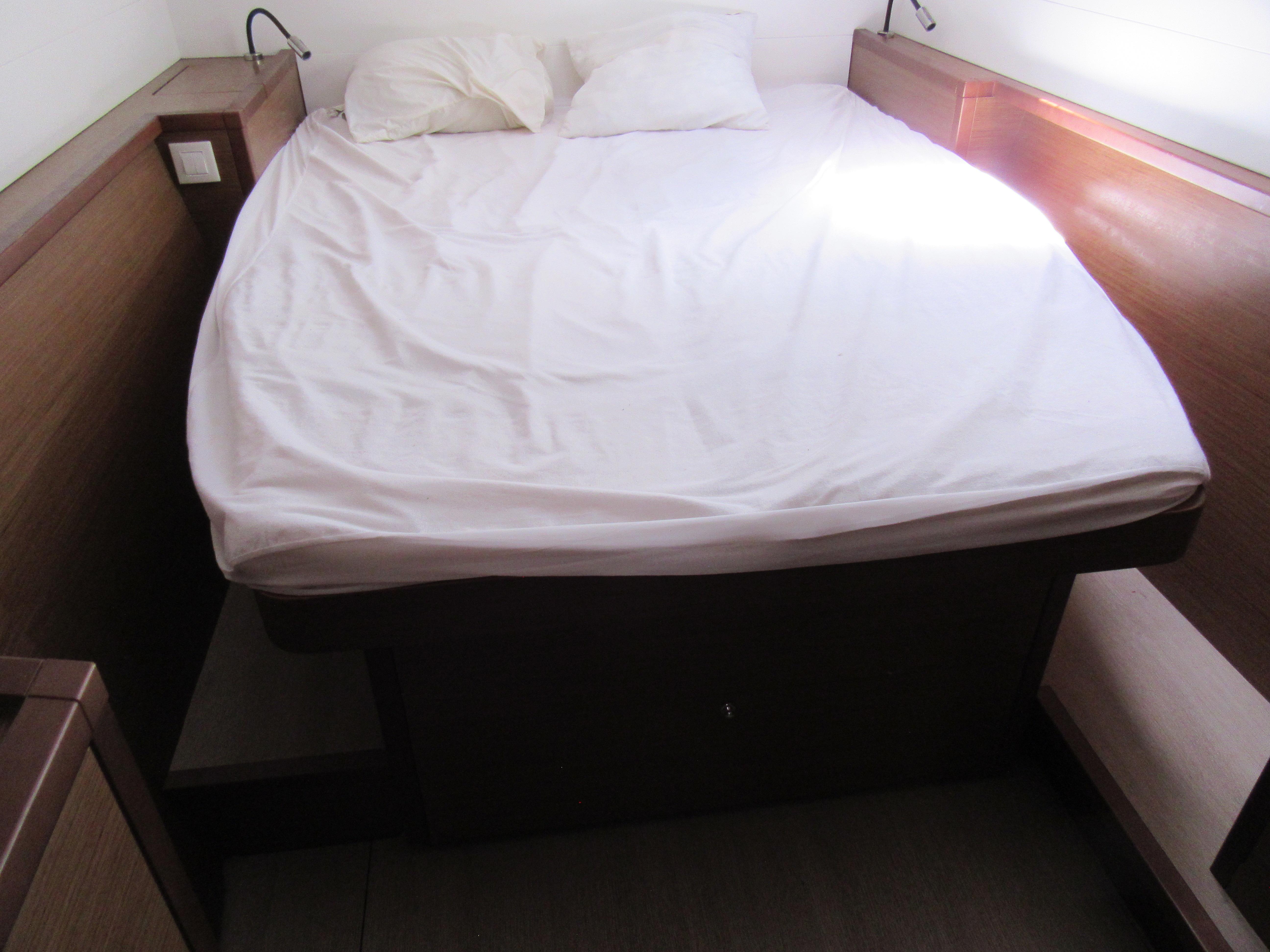 Lagoon 450S 2018 model interior cabin with bed and pillows.