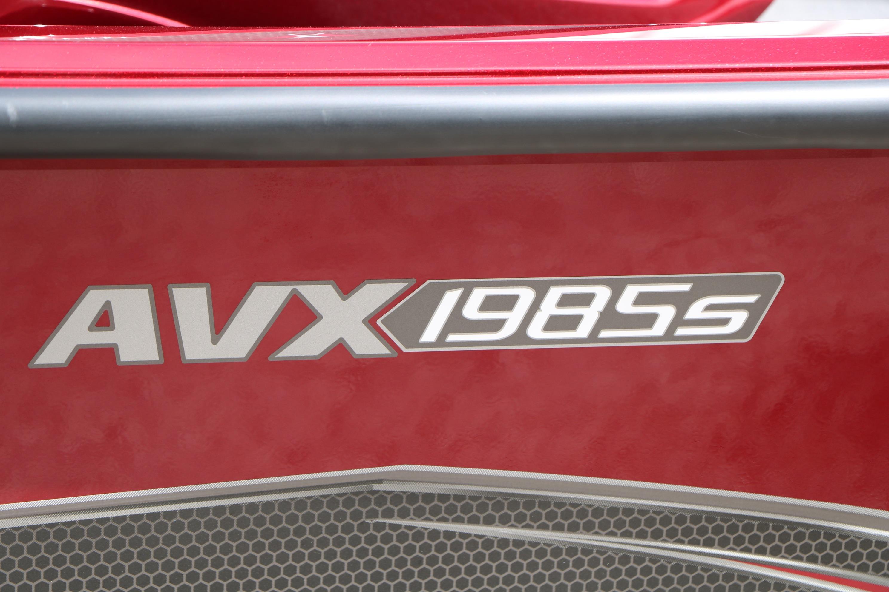 Red Vexus AVX 1985s boat, model year 2026, with bold lettering.