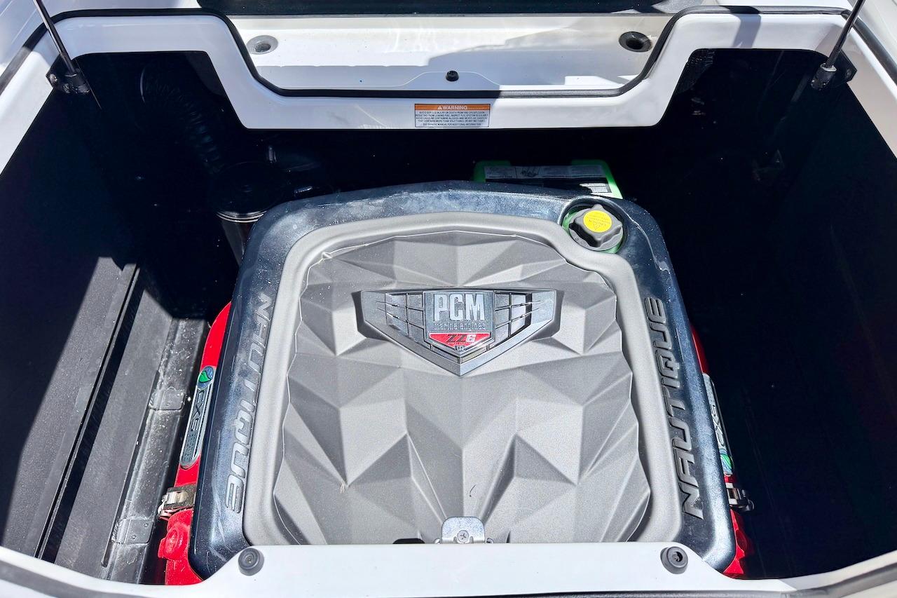 2021 Nautique Super Air Nautique G23 engine compartment with PCM engine cover.