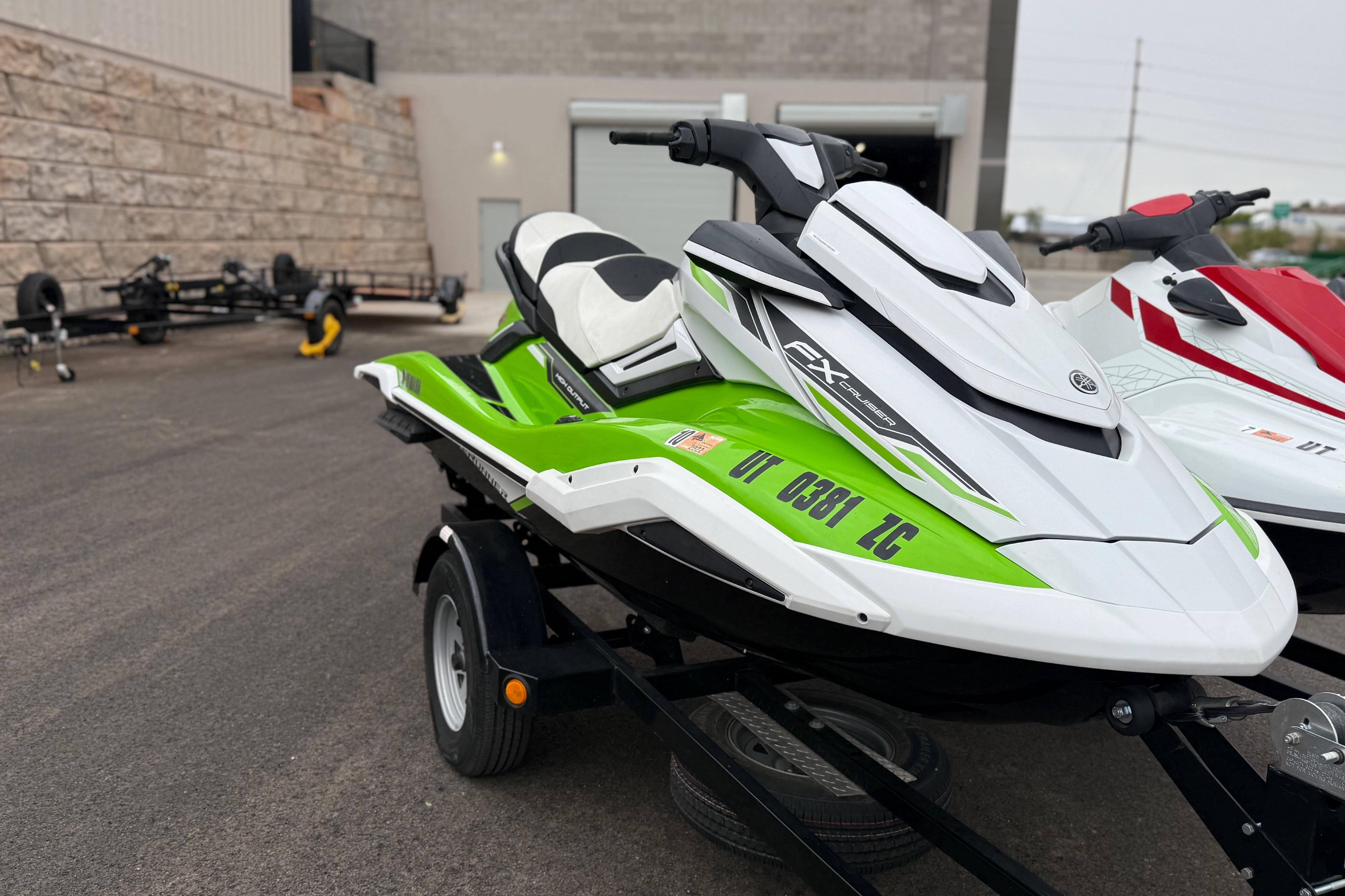 2021 Yamaha WaveRunner FX Cruiser HO in green and white on a trailer.